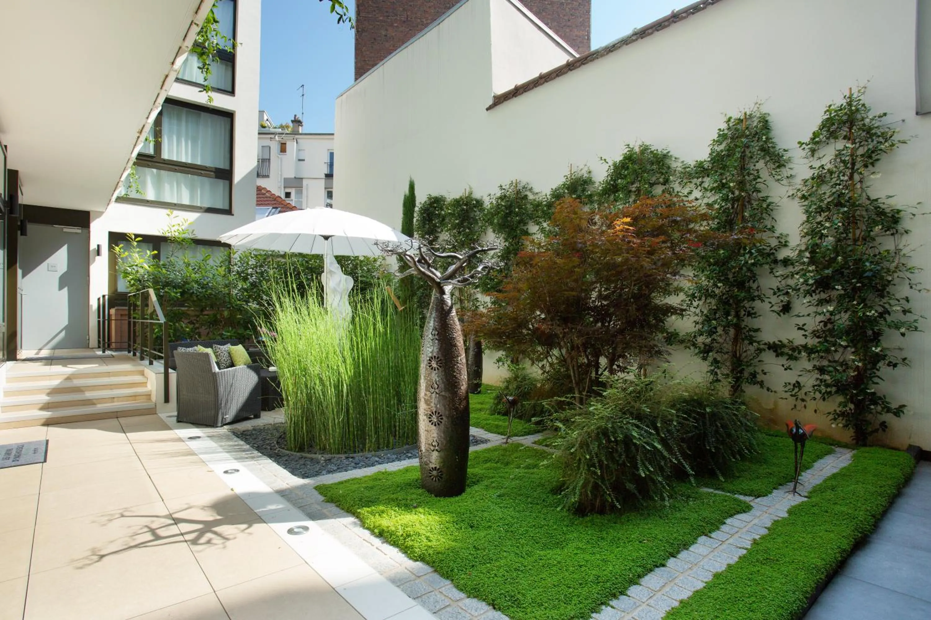 Garden in Jardins de Mademoiselle Hôtel & Spa