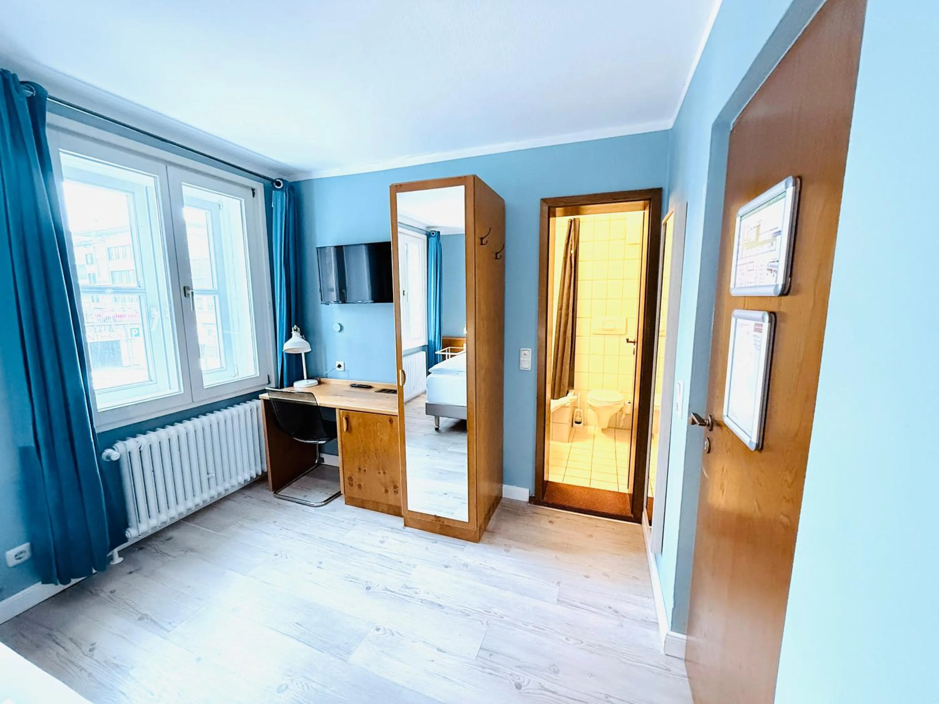 Photo of the whole room, Bed in Hotel Pelli Hof Rendsburg by Tulip Inn