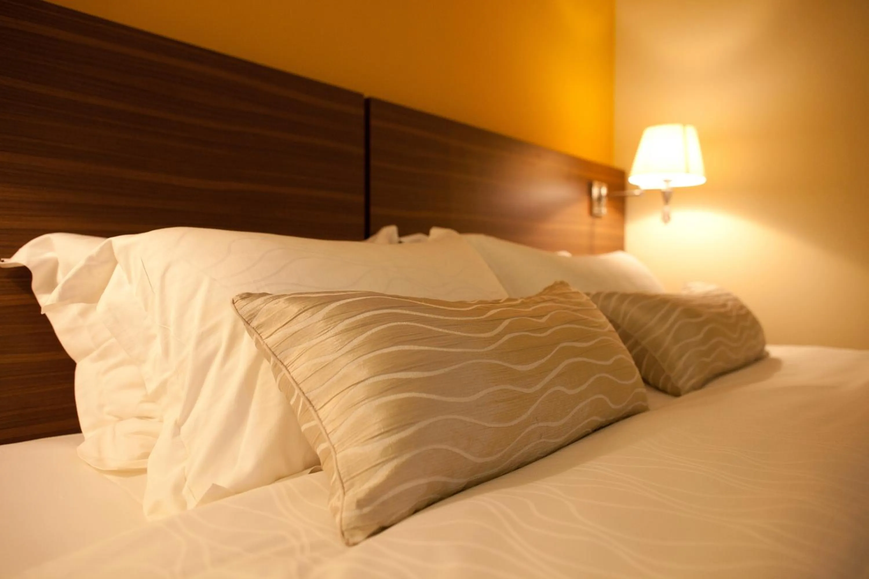 Bed in Pine Tree Hotel