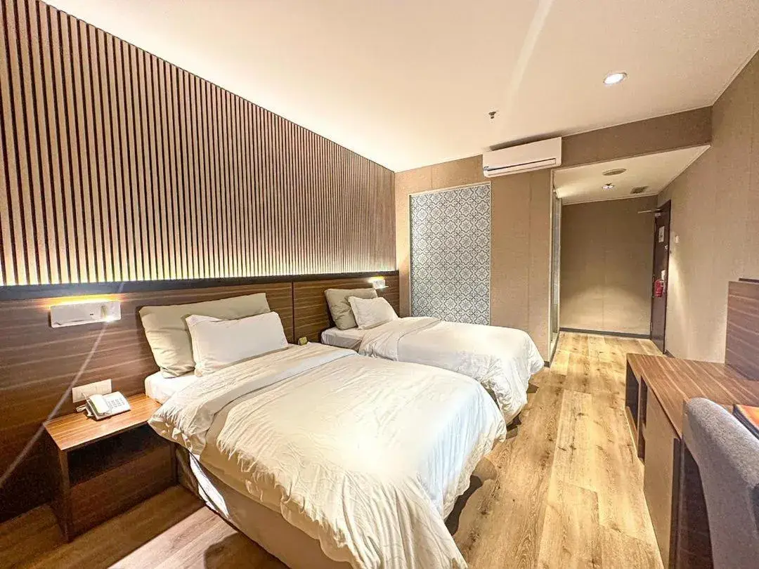 Bed in Pine Tree Hotel Bed in Pine Tree Hotel