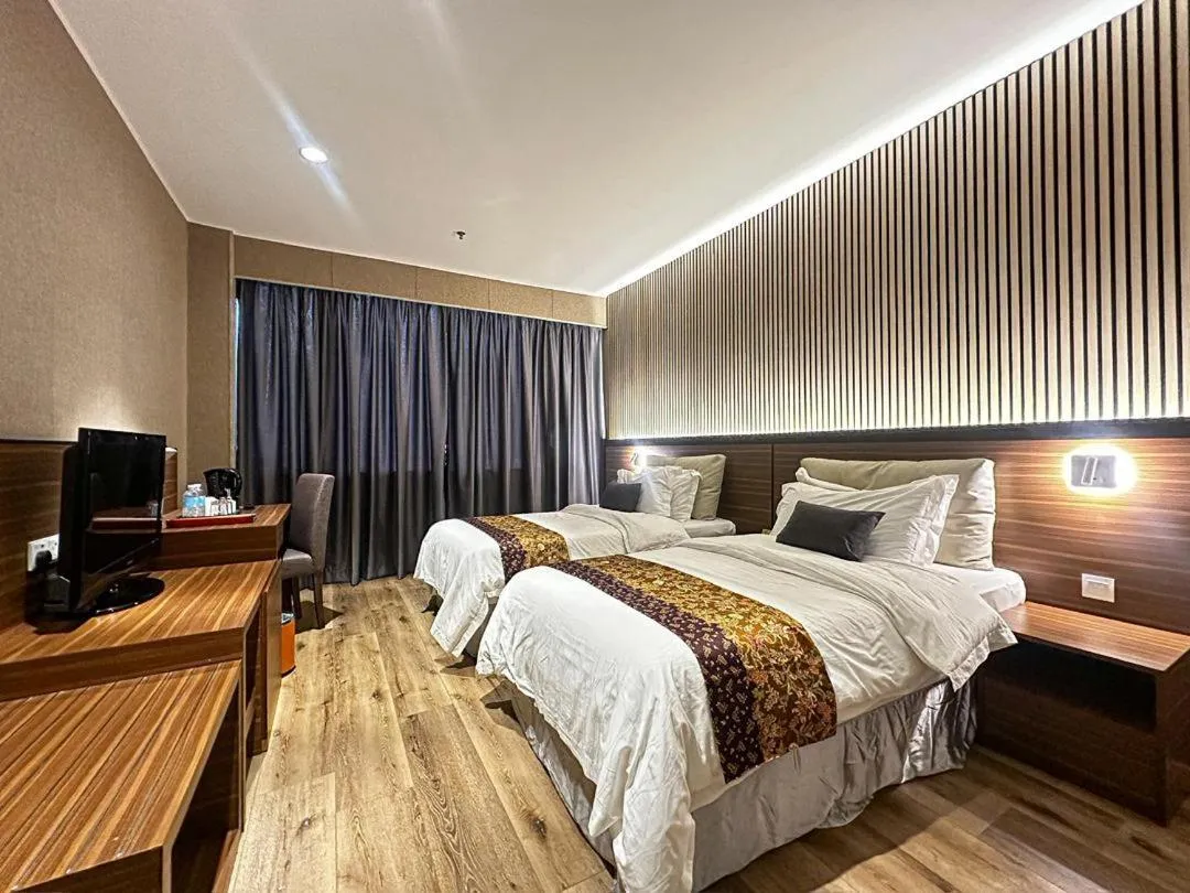 Bed in Pine Tree Hotel