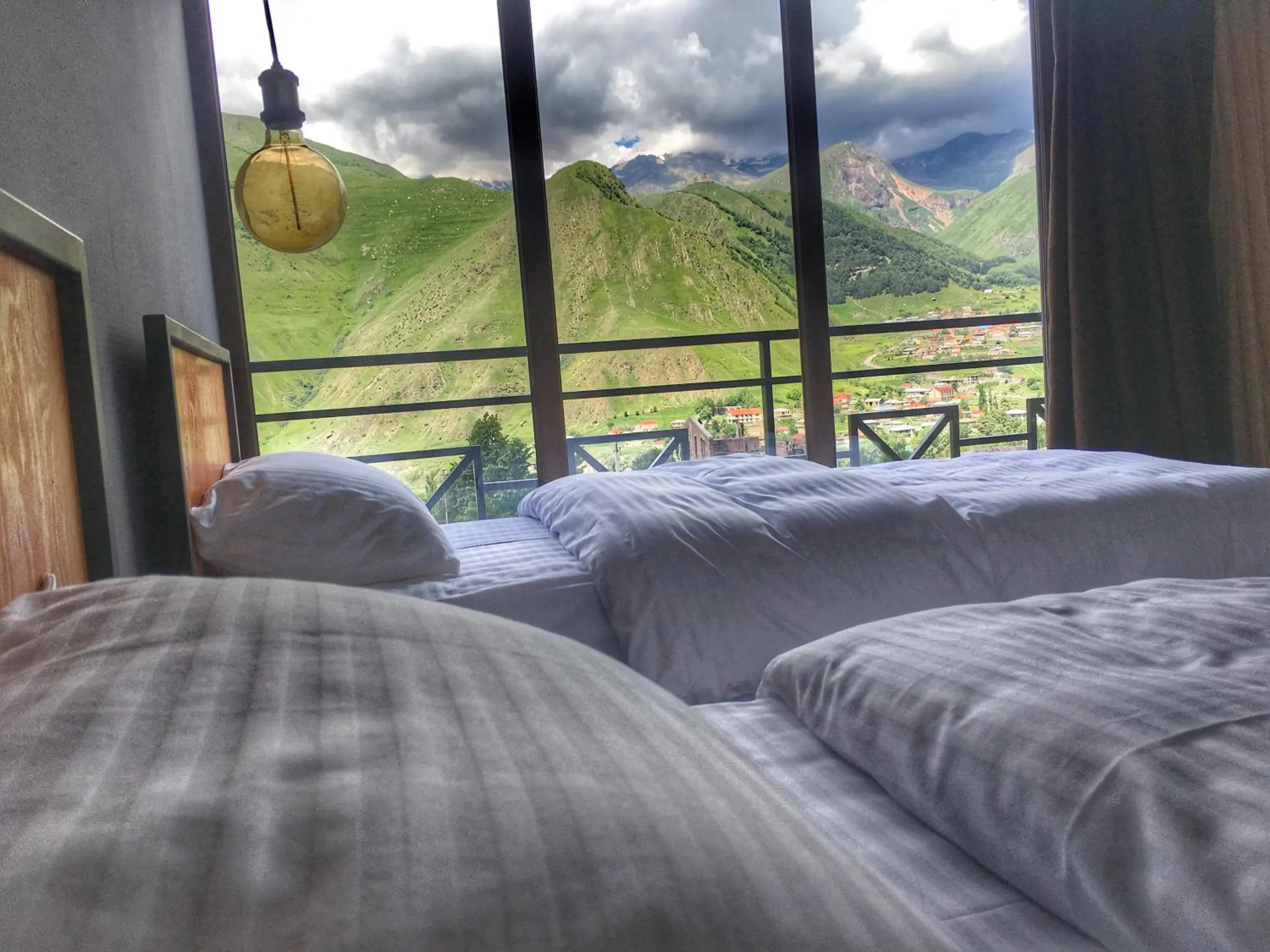 Garden view, Bed in Chemodann Kazbegi