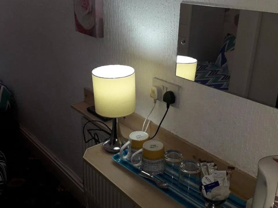 Bedroom in Belroy Hotel