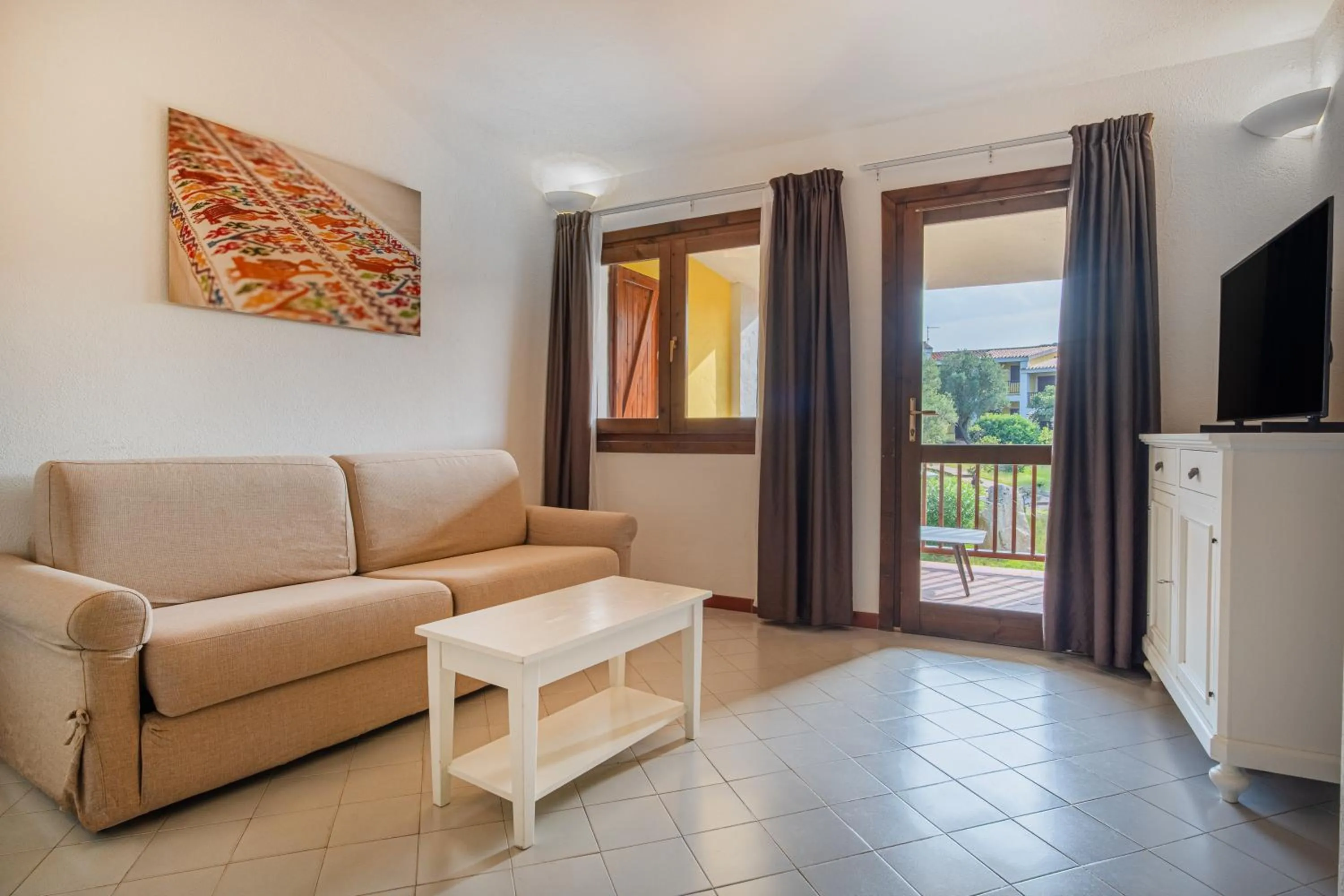 Living room in Felix Hotels - Residence Hotel Costa Serena