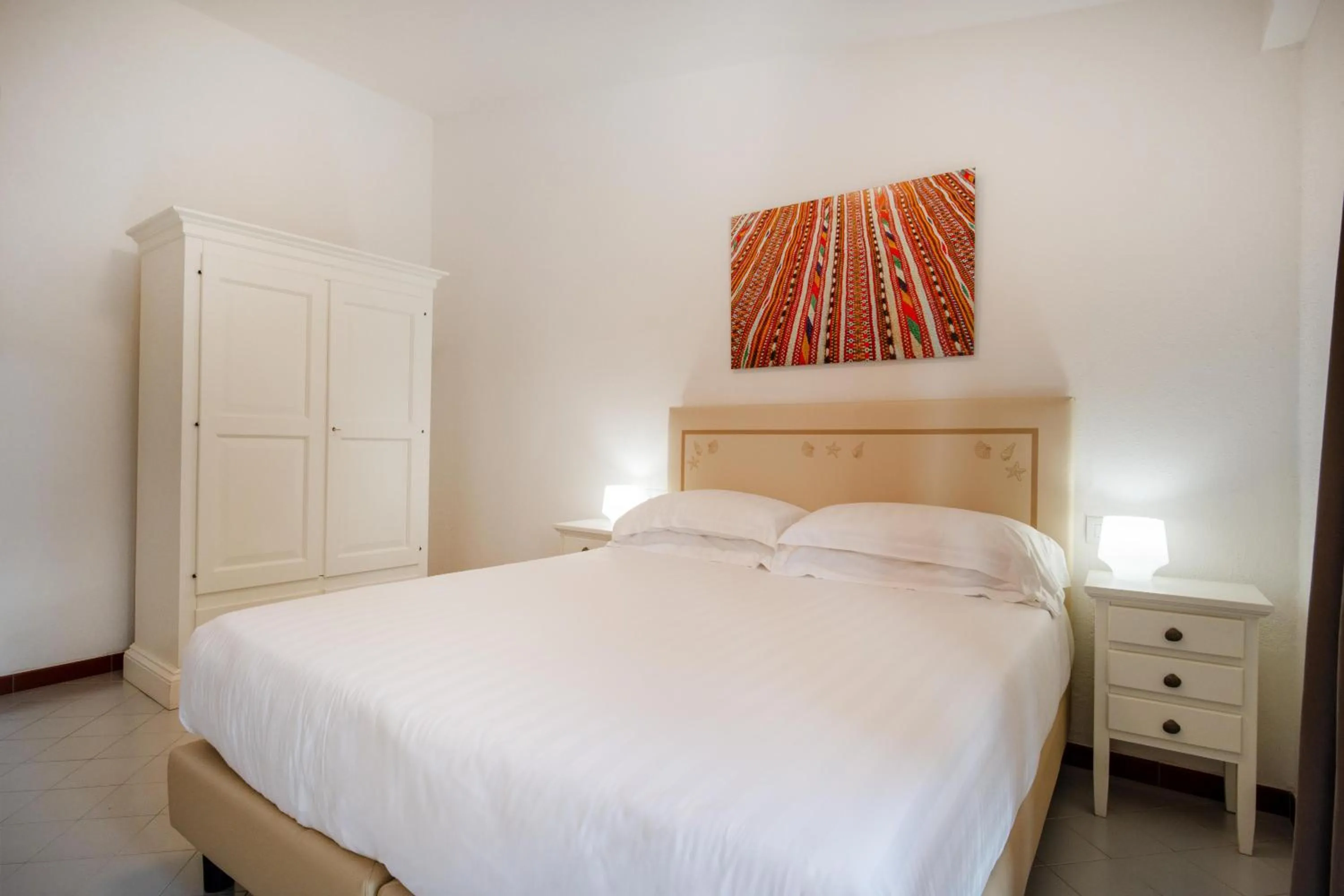 Bed in Felix Hotels - Residence Hotel Costa Serena