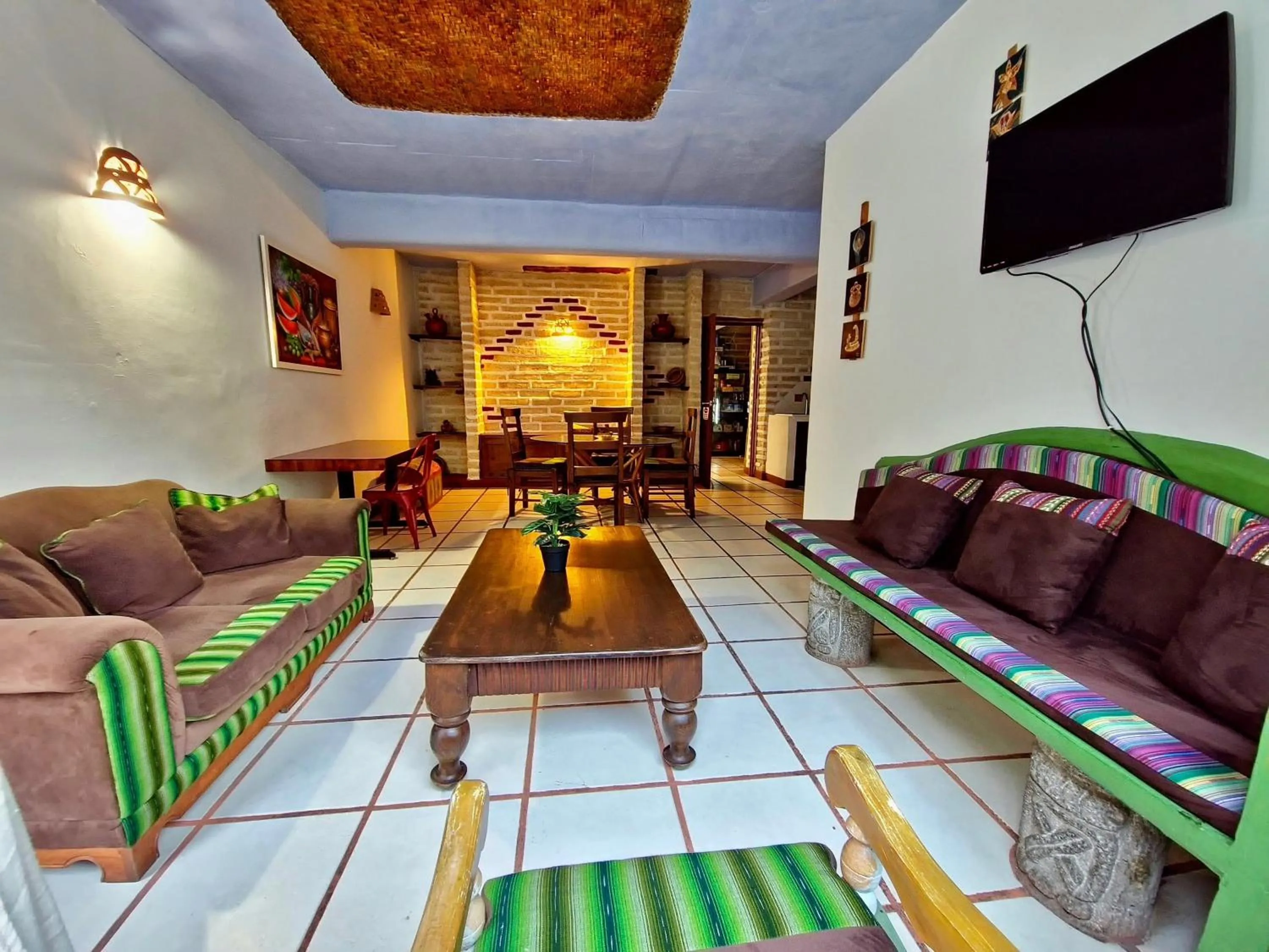 Communal lounge/ TV room in Eco Suites Uxlabil Guatemala