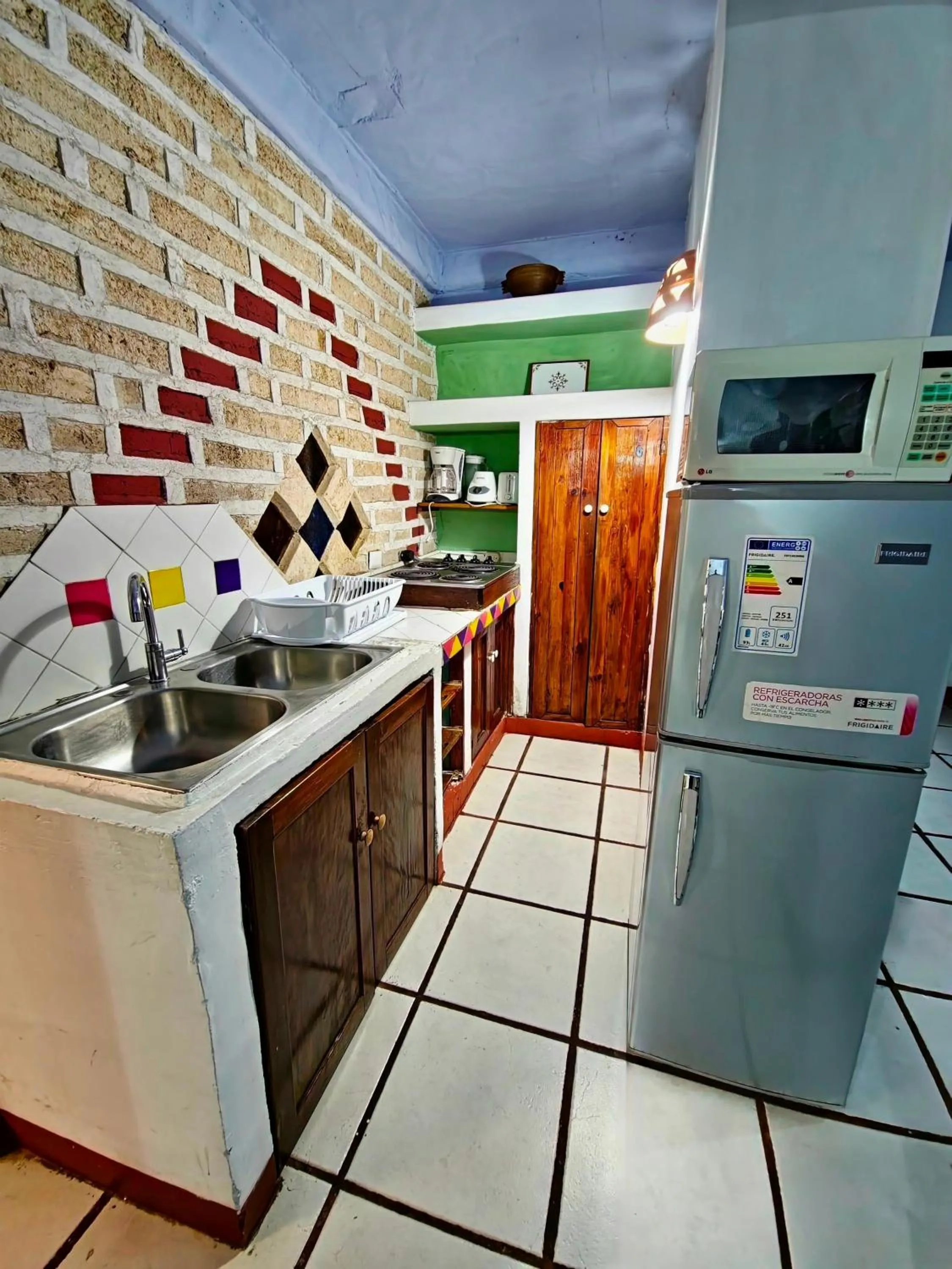 Kitchen or kitchenette in Eco Suites Uxlabil Guatemala