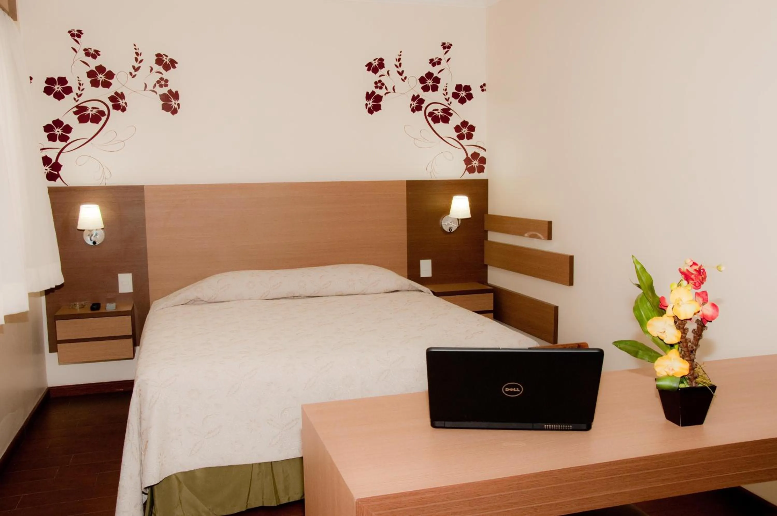 Decorative detail, Bed in Hotel Premium Pirassununga