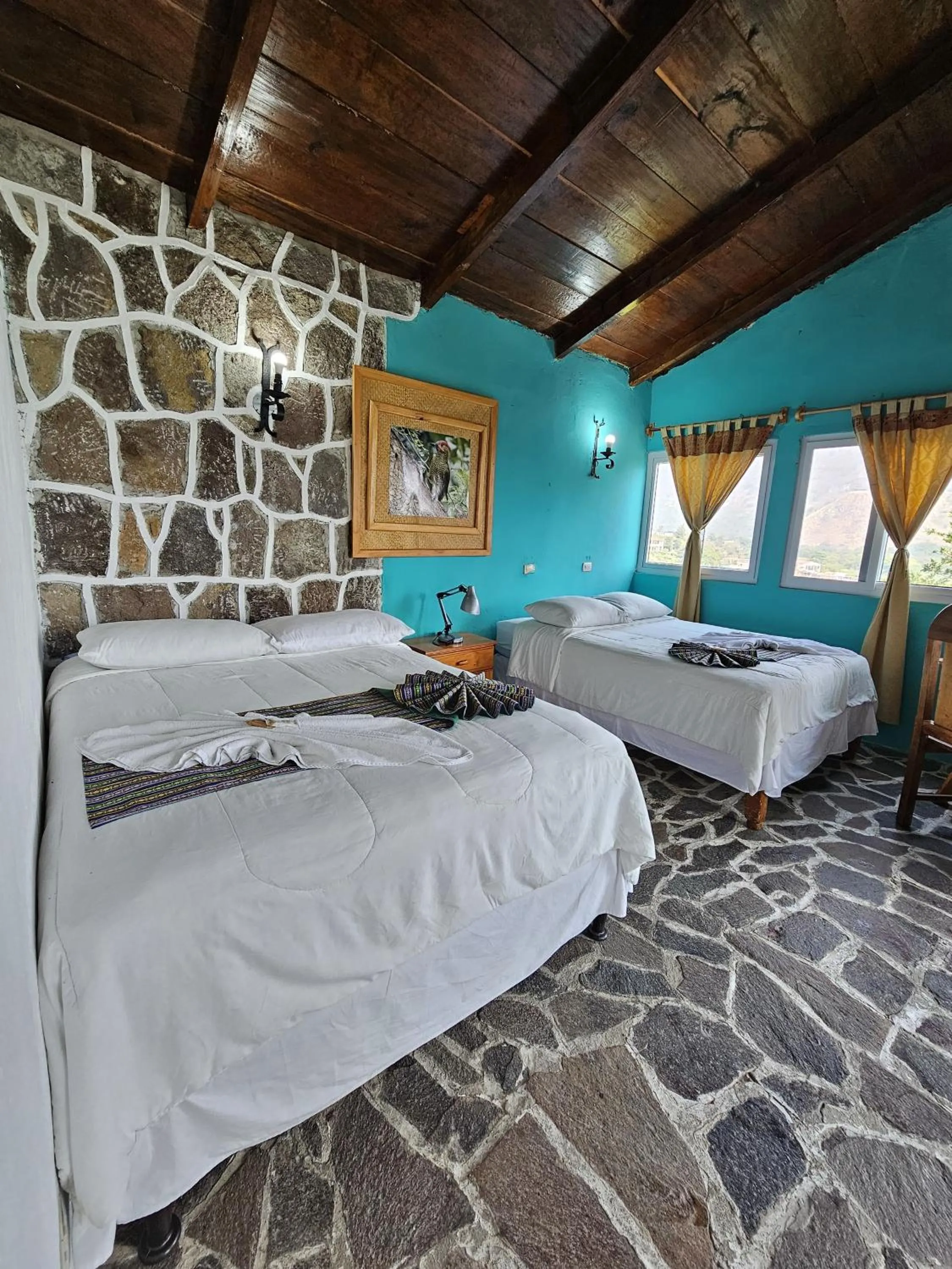 Photo of the whole room, Bed in Eco Hotel Uxlabil Atitlan