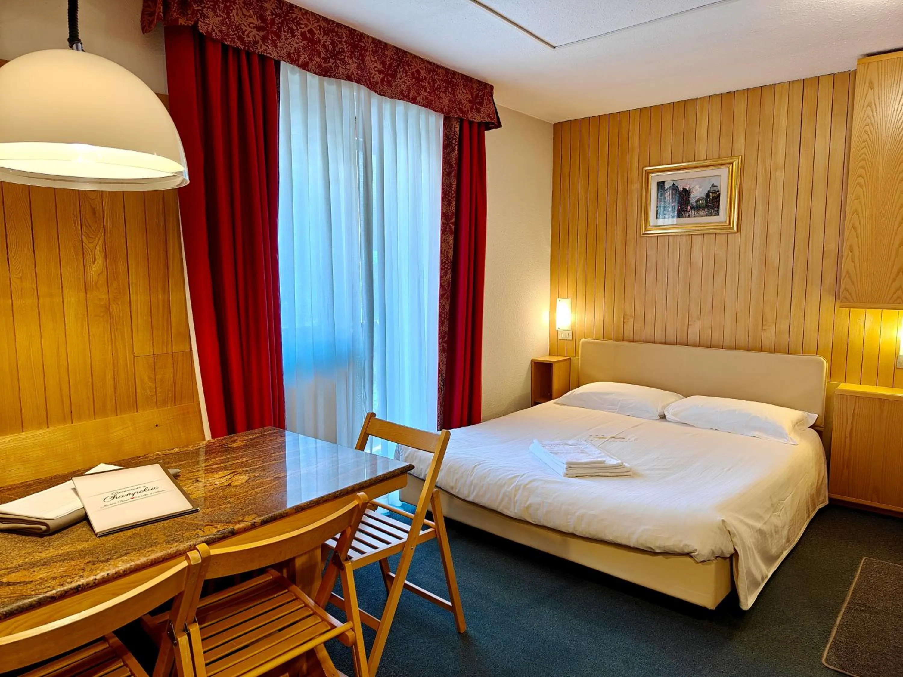 Living room, Bed in Residence Les Coupoles