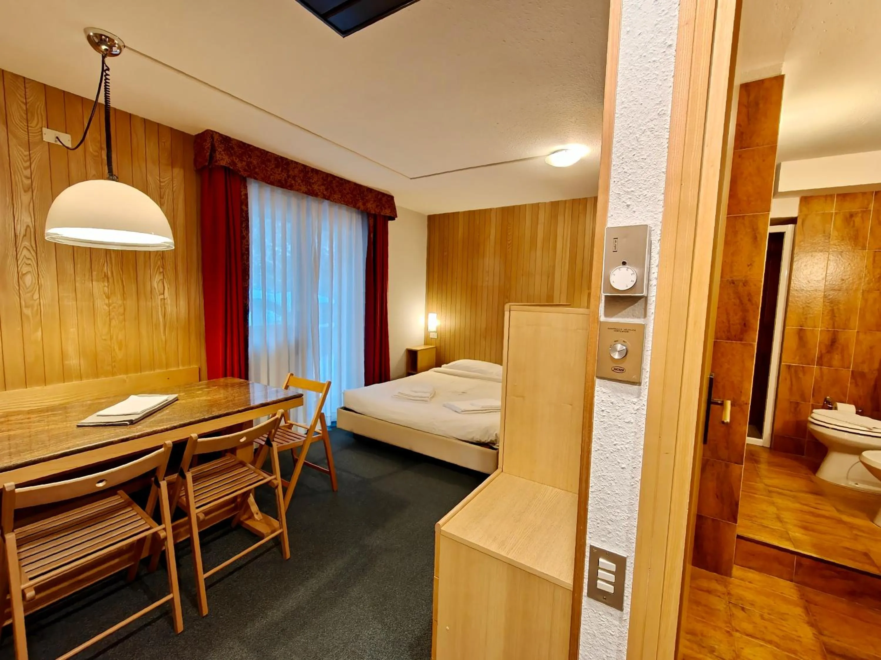 Living room, Bed in Residence Les Coupoles