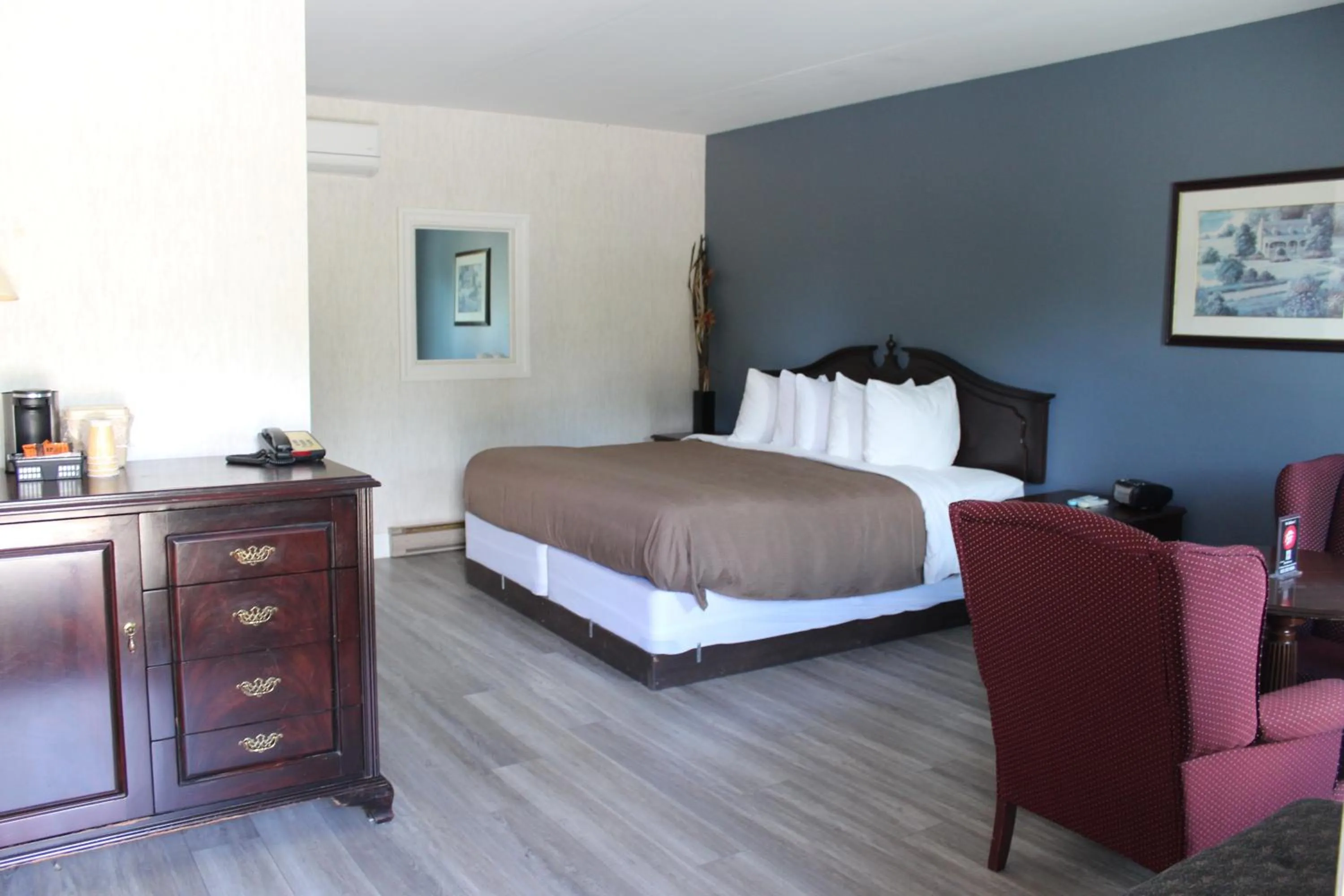 Bed in Bancroft Inn & Suites