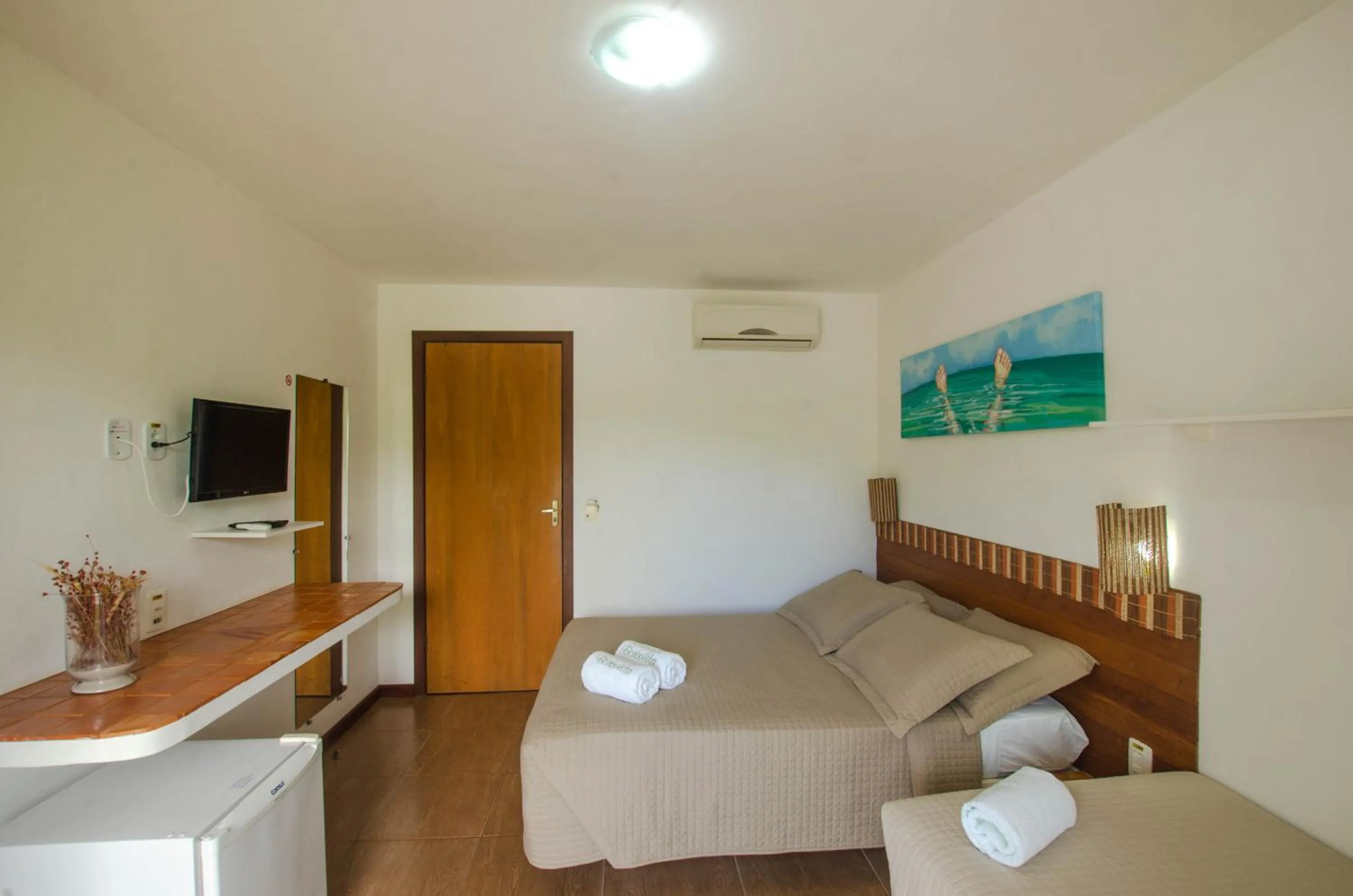 Photo of the whole room, Bed in Pousada Borboleta