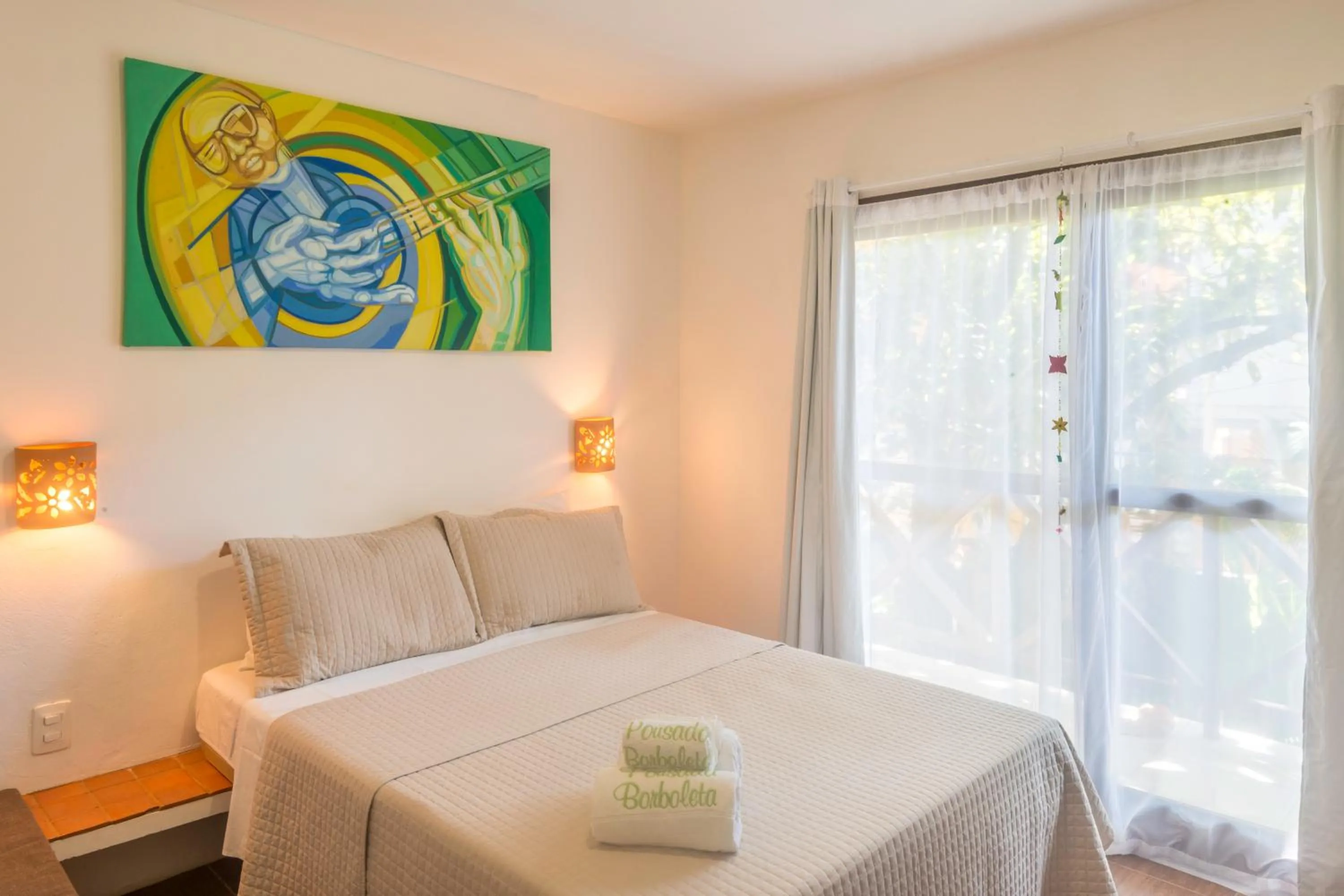 Photo of the whole room, Bed in Pousada Borboleta