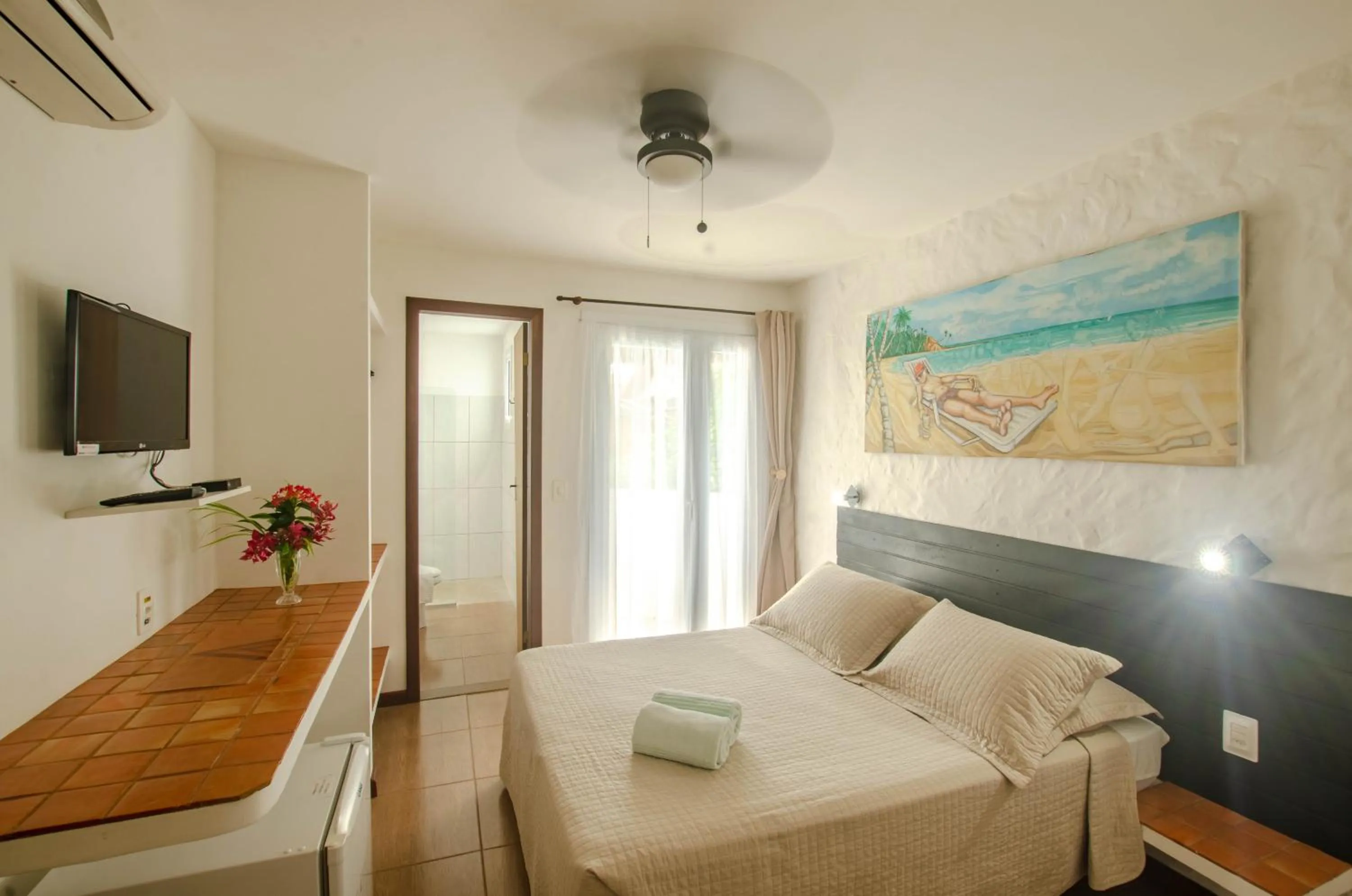 Photo of the whole room, Bed in Pousada Borboleta