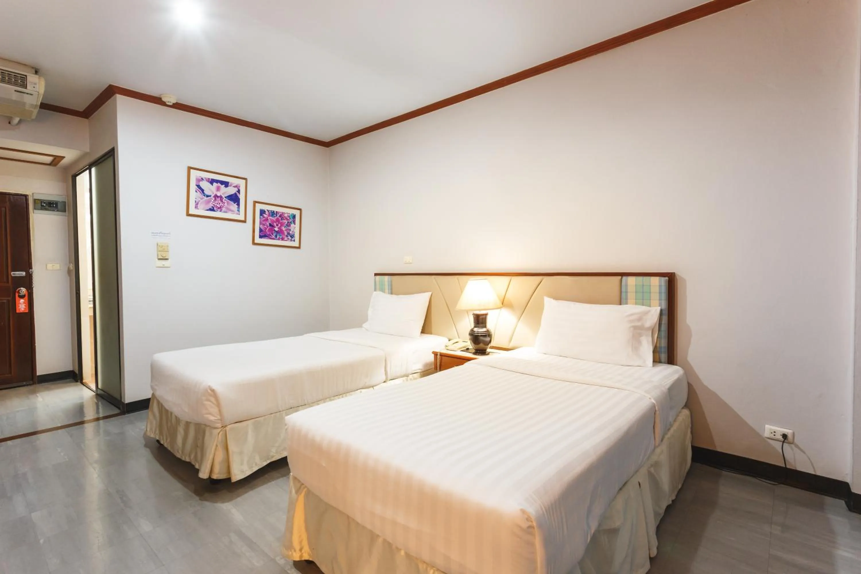 Bed in Surin Majestic Hotel