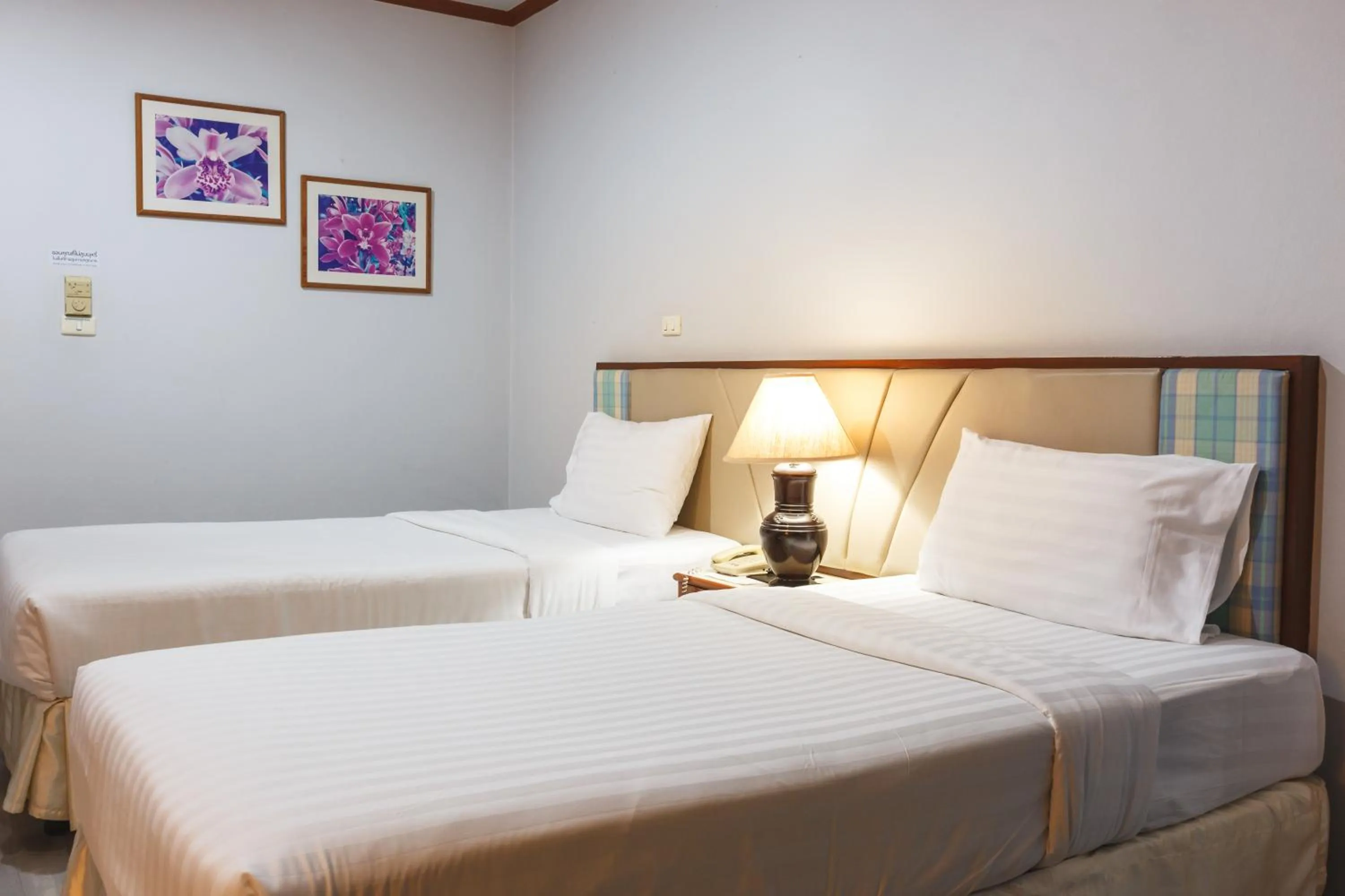 Bed in Surin Majestic Hotel