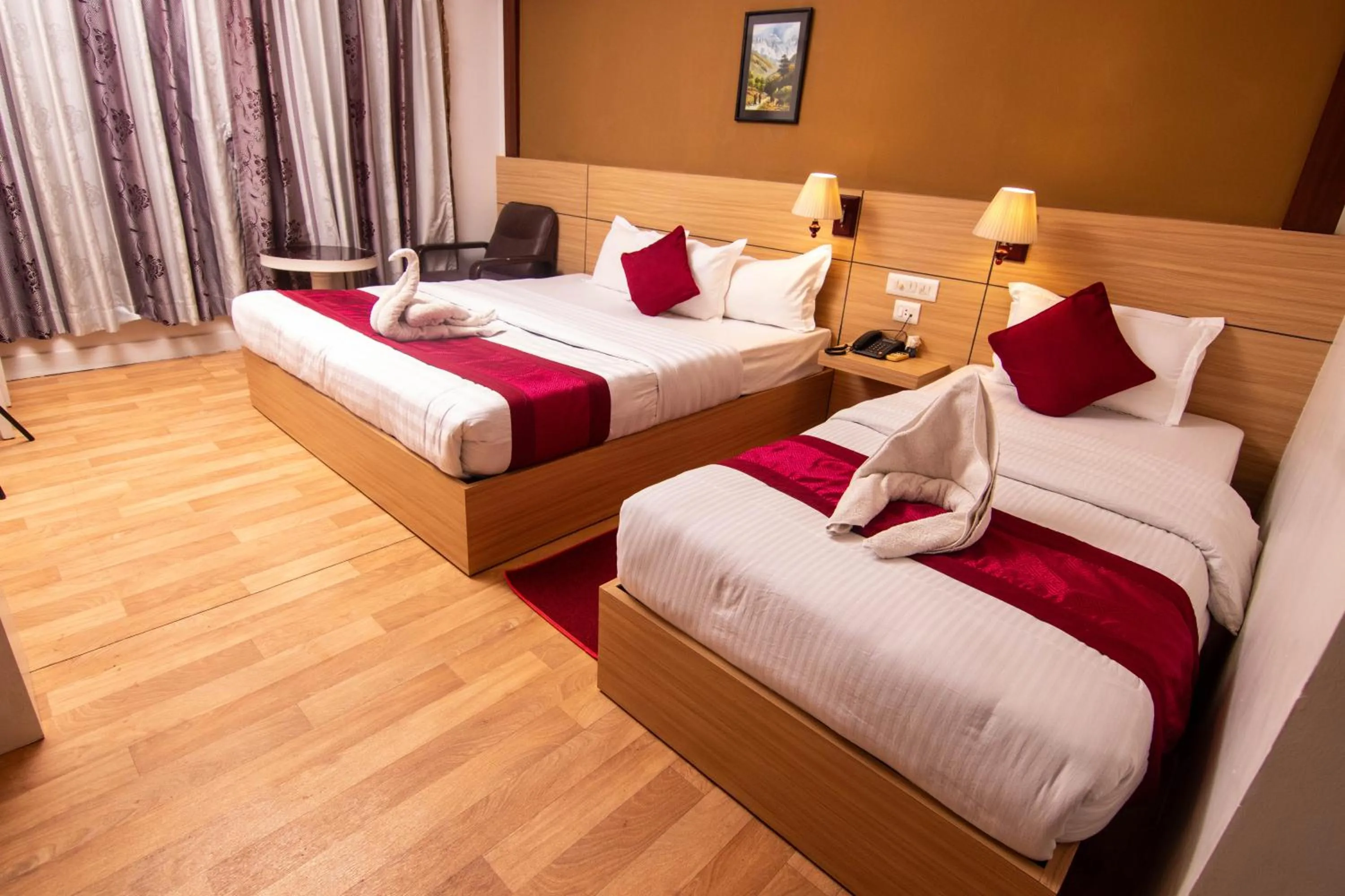 Bed in Hotel Ananda Inn