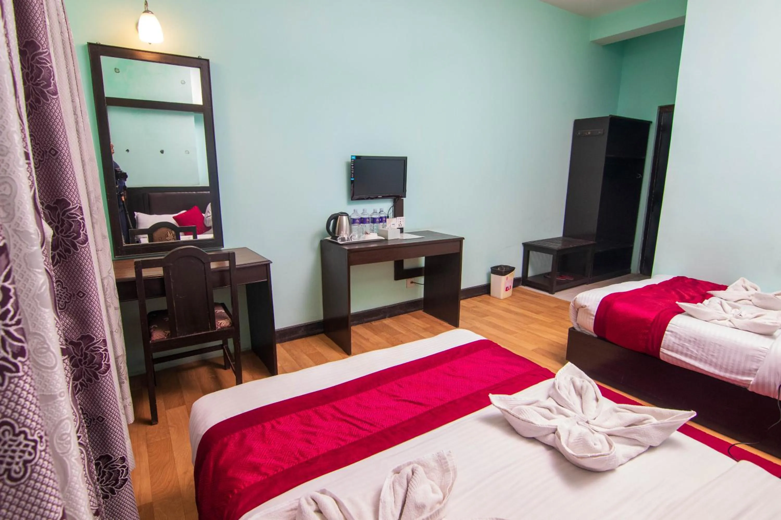 Bed in Hotel Ananda Inn