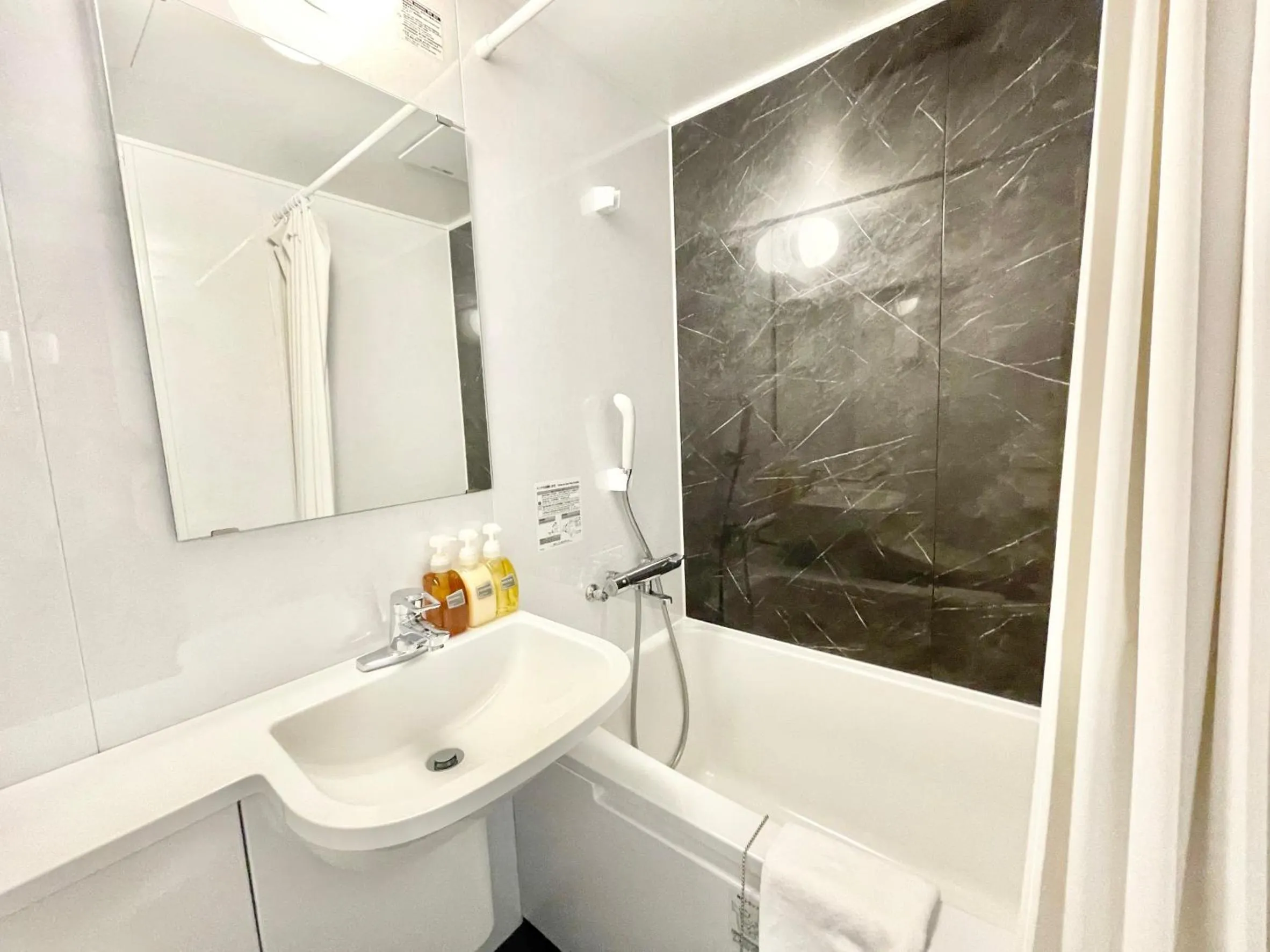 Shower in Tabist Hotel New Washington Shibuya