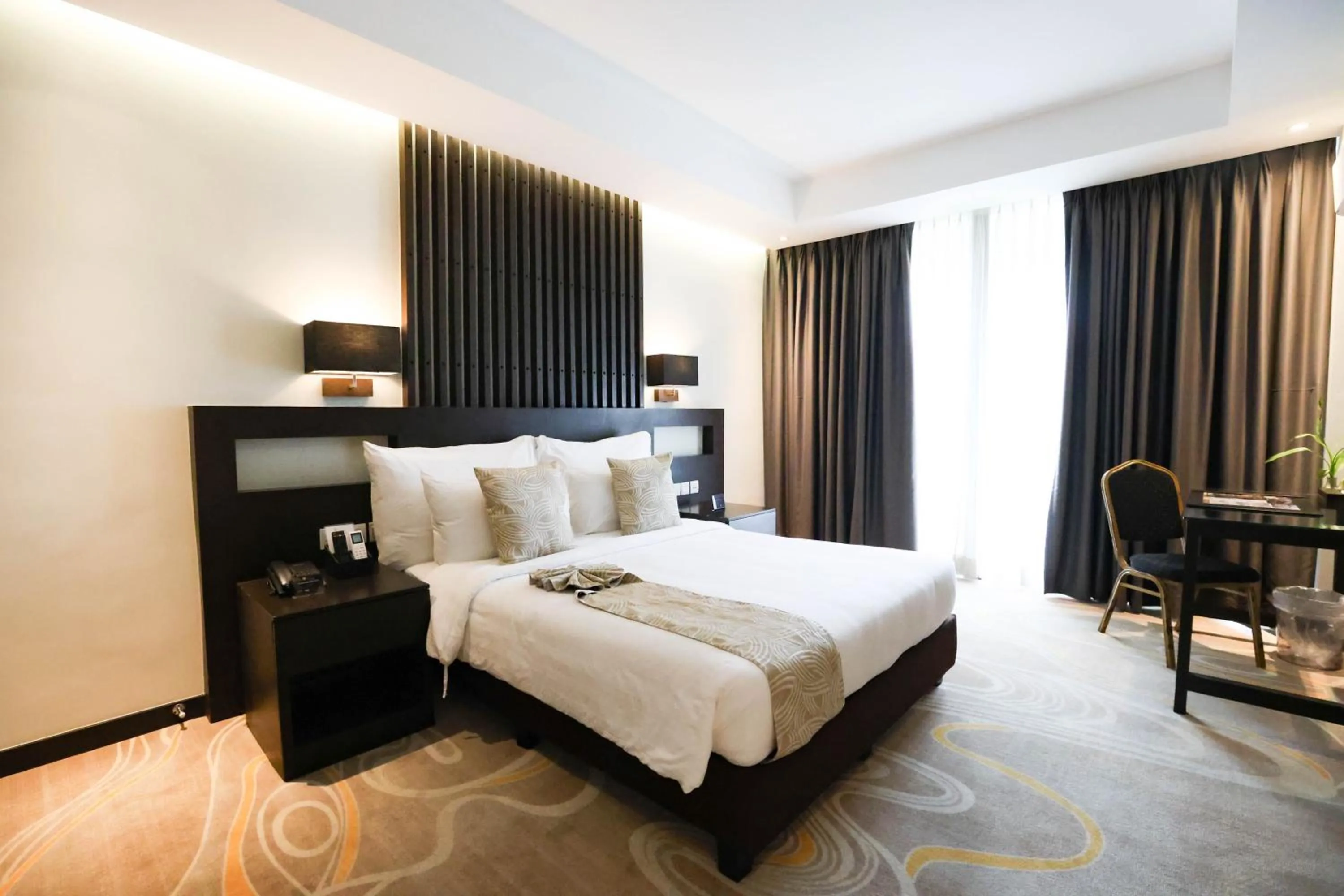 Bed in The Oriental Hotel Legazpi