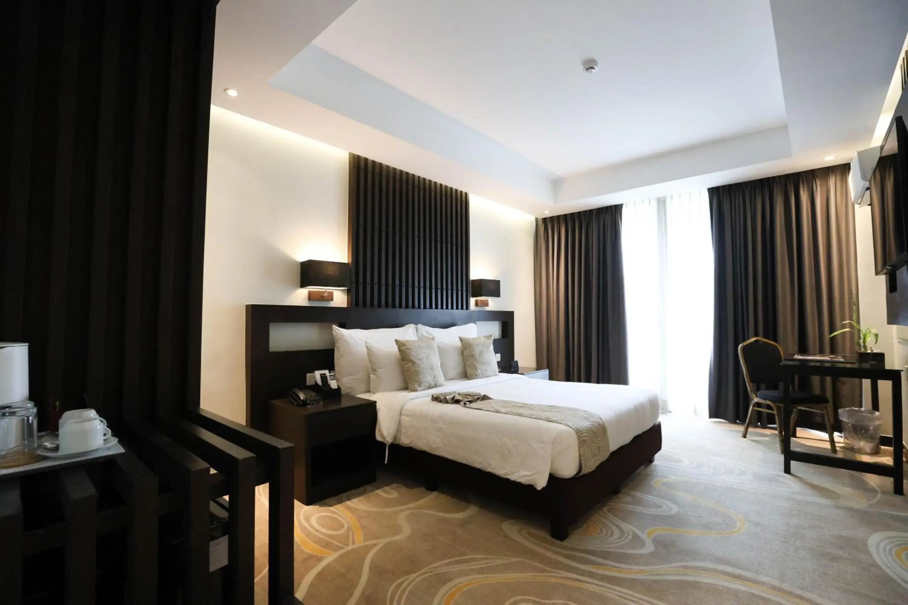 Bed in The Oriental Hotel Legazpi Bed in The Oriental Hotel Legazpi