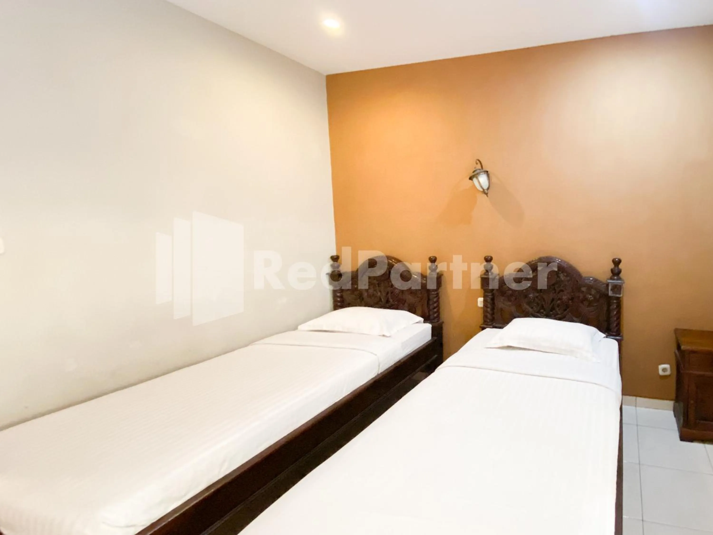 Bed in Istana Griya 2 Hotel Solo RedPartner