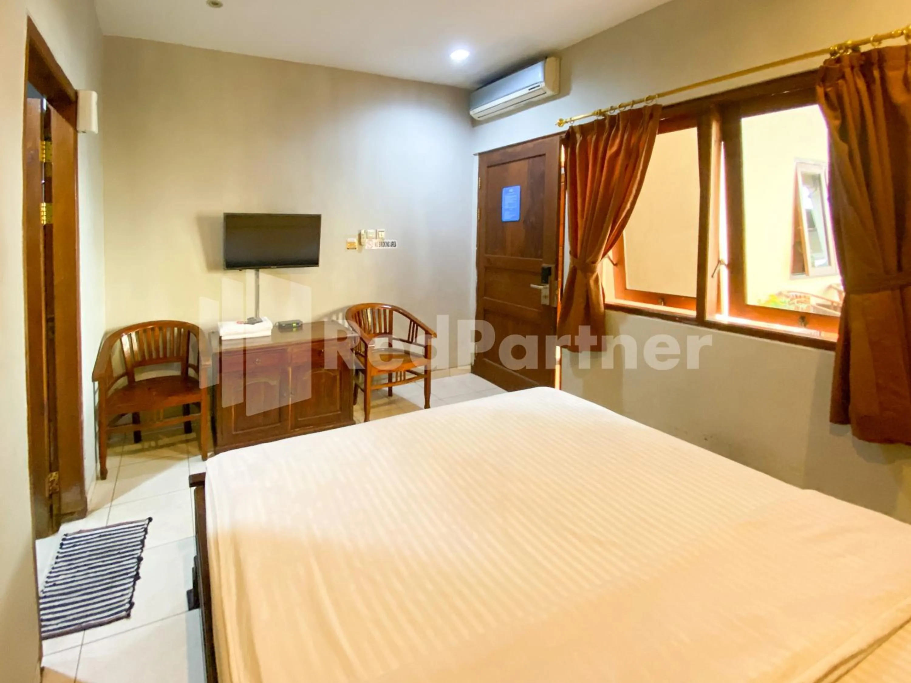 Bed in Istana Griya 2 Hotel Solo RedPartner