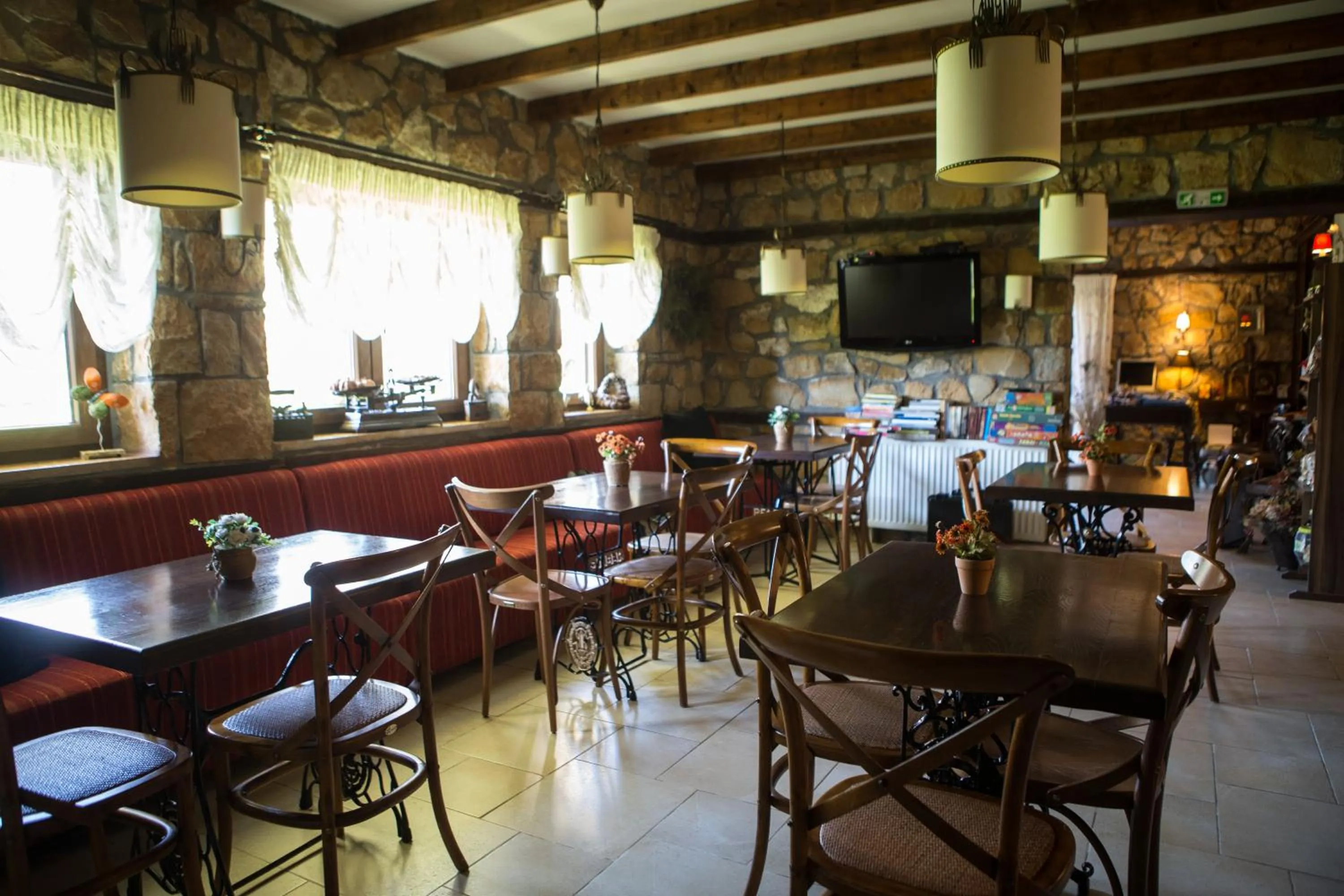 Communal lounge/ TV room in Archontiko Emmanouilidi Suites