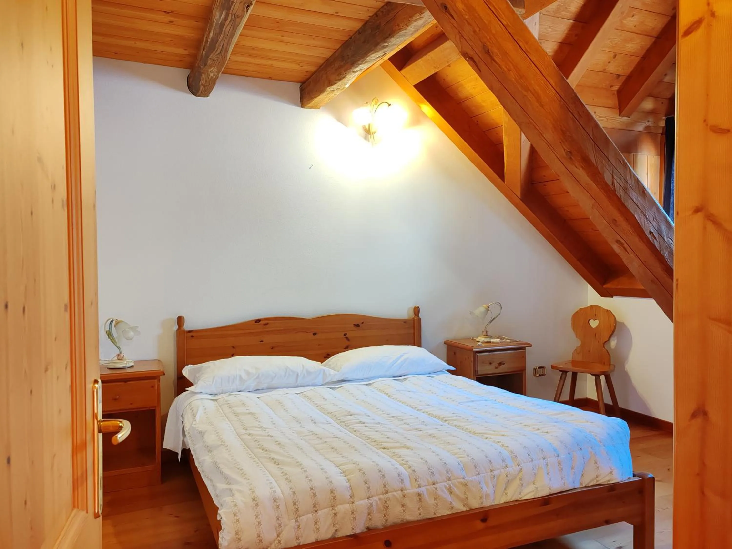 Bed in Albergo Diffuso Comeglians