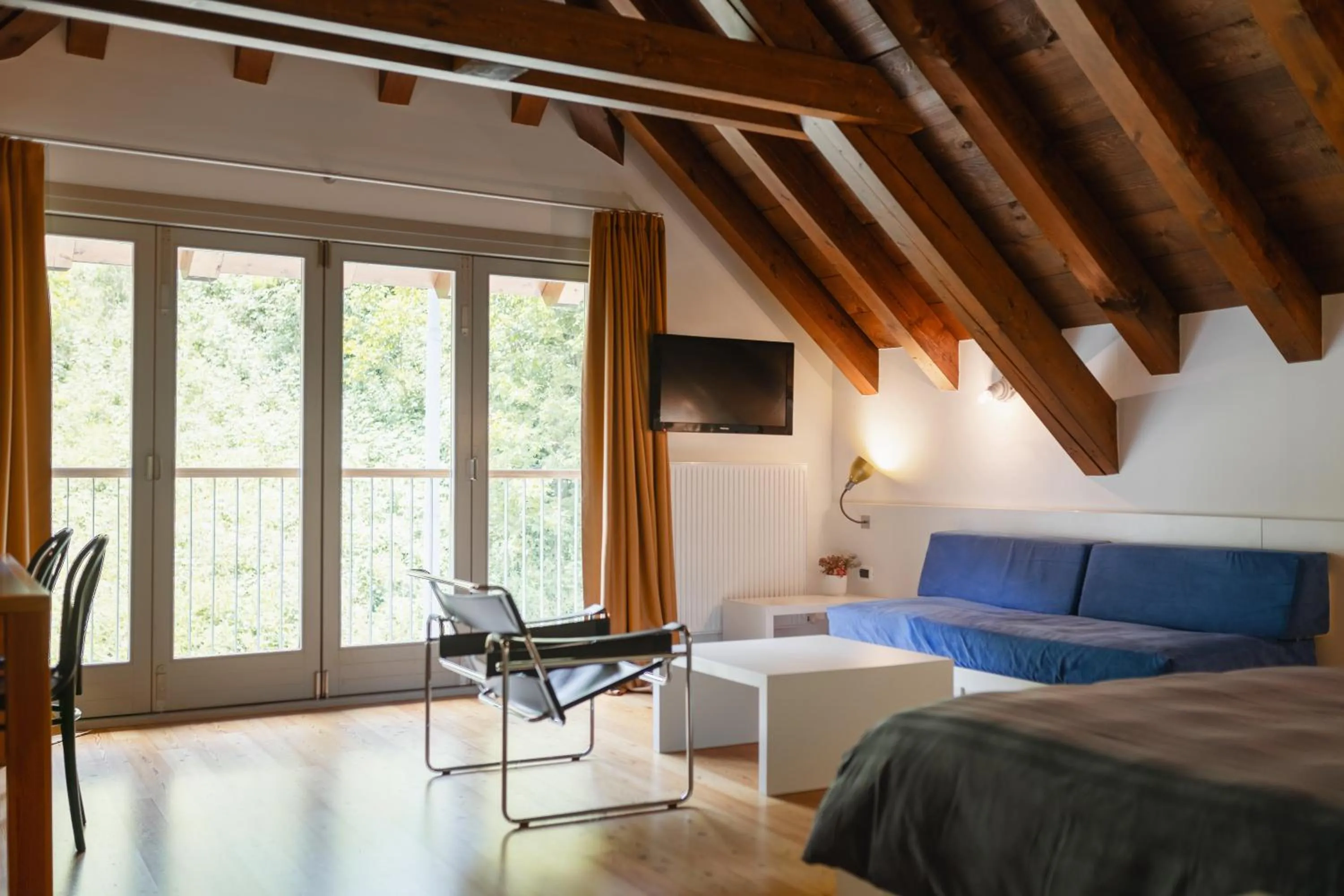 Bed in Albergo Diffuso Comeglians