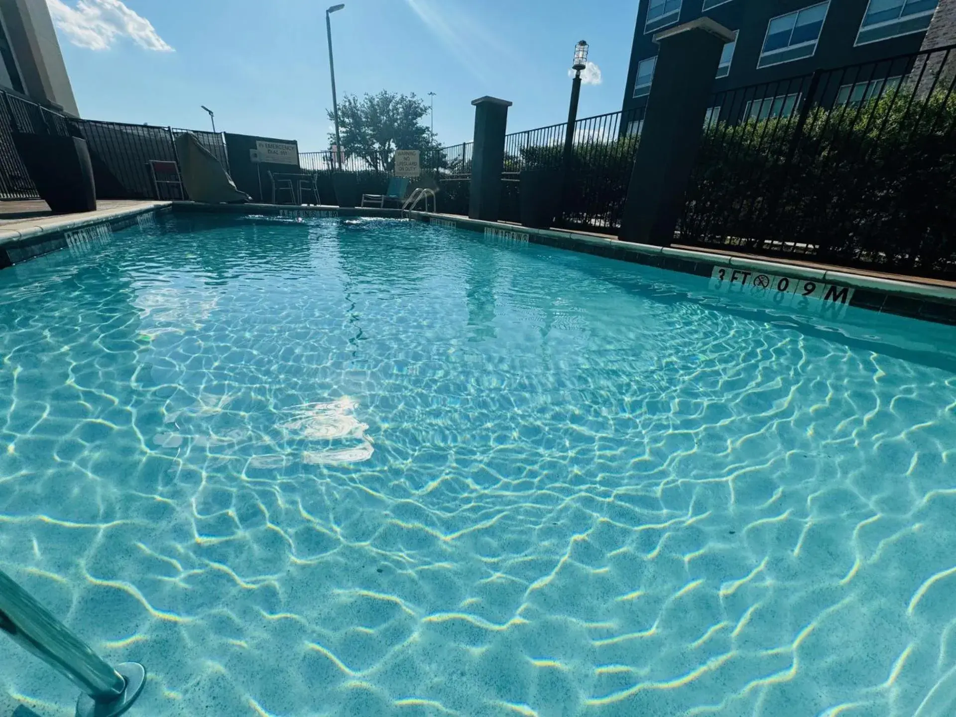 Swimming pool in Hampton Inn & Suites Dallas/Plano Central Swimming pool in Hampton Inn & Suites Dallas/Plano Central