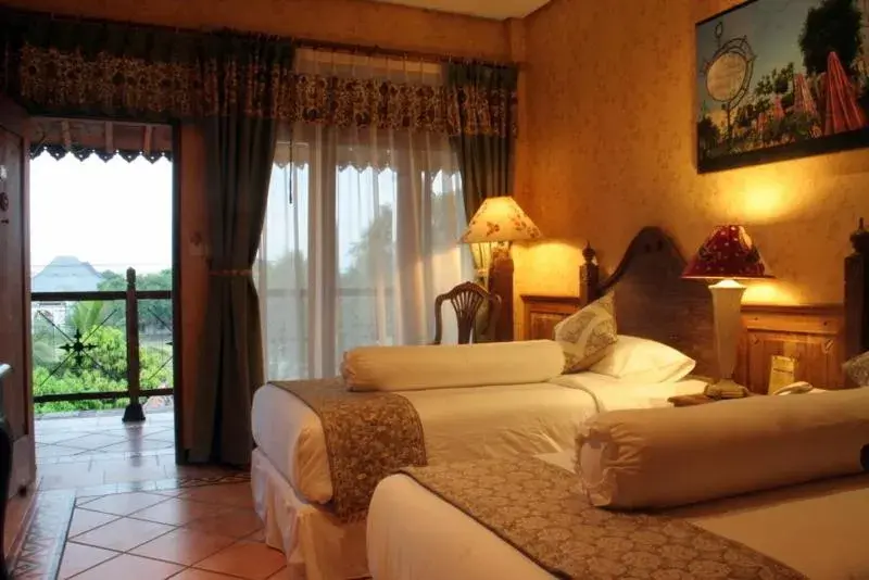 Bed in Omah Sinten Heritage Hotel & Resto Bed in Omah Sinten Heritage Hotel & Resto