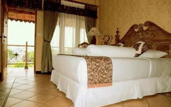 Bed in Omah Sinten Heritage Hotel & Resto Bed in Omah Sinten Heritage Hotel & Resto
