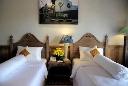 Bed in Omah Sinten Heritage Hotel & Resto