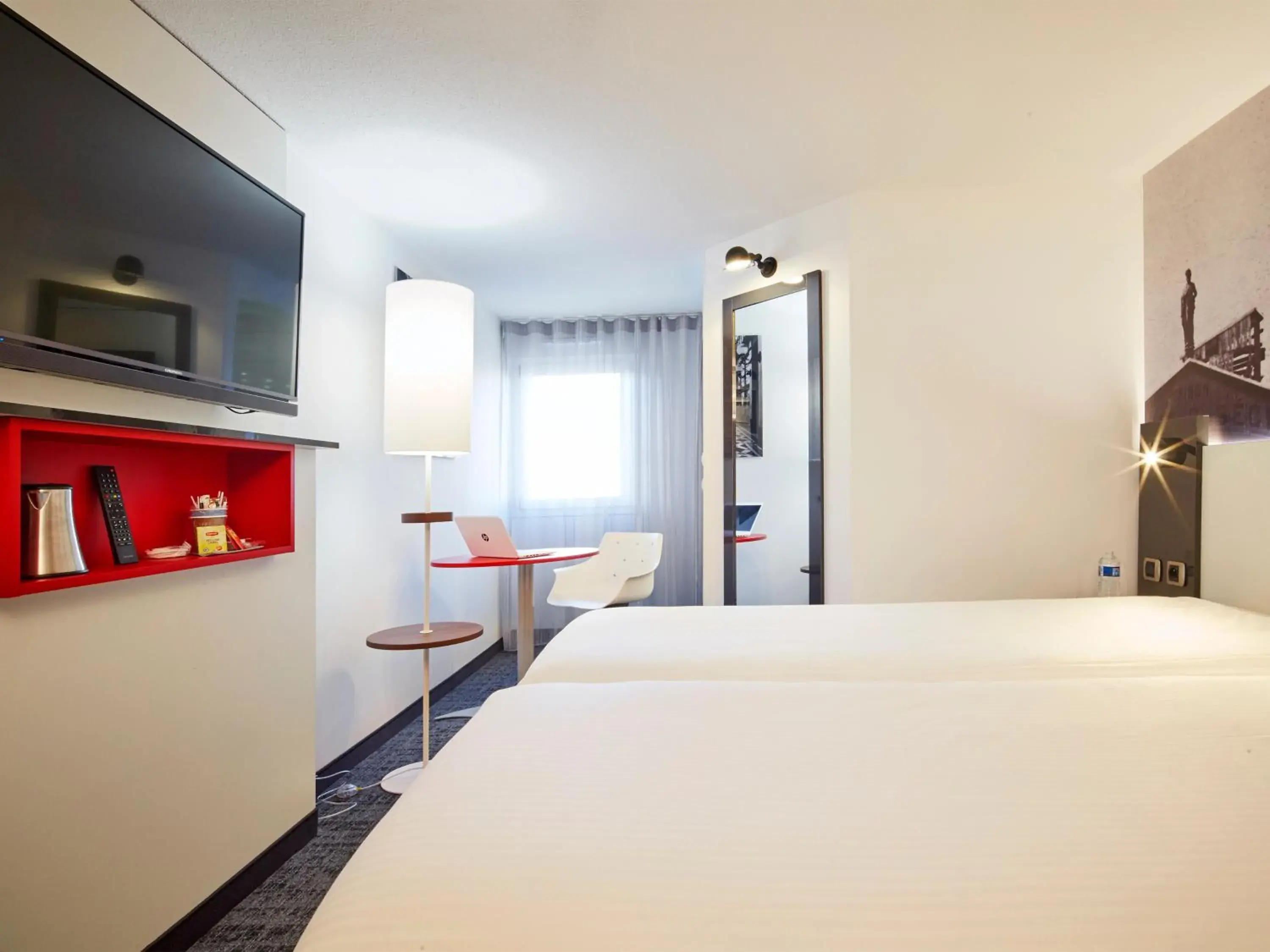Bed in Kyriad Colmar Centre Unterlinden Bed in Kyriad Colmar Centre Unterlinden