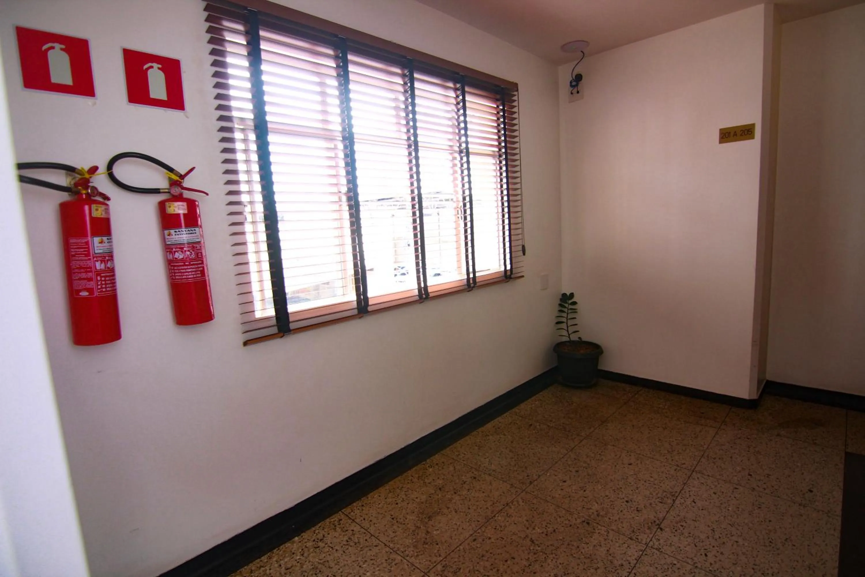 Property logo or sign in Hotel Alpha