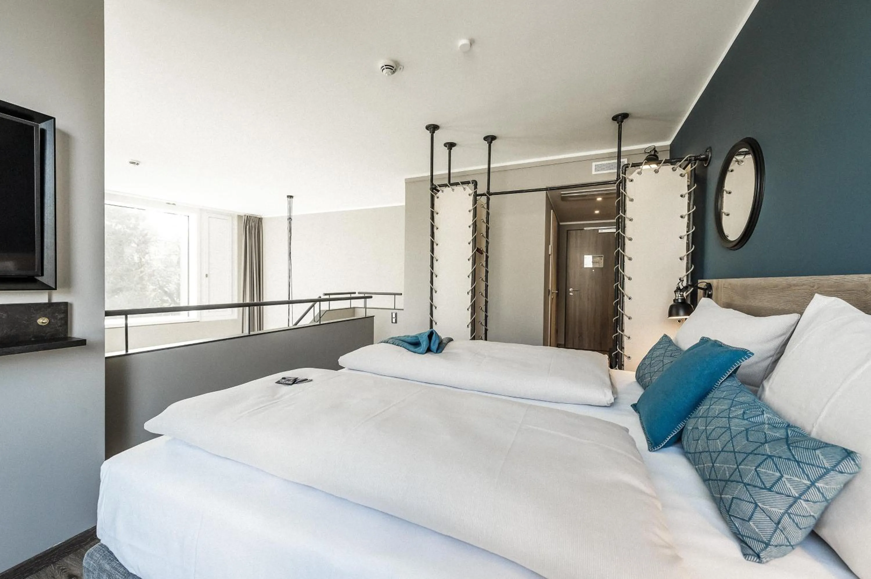 Photo of the whole room, Bed in HARBR Hotel Konstanz, a member of Radisson Individuals