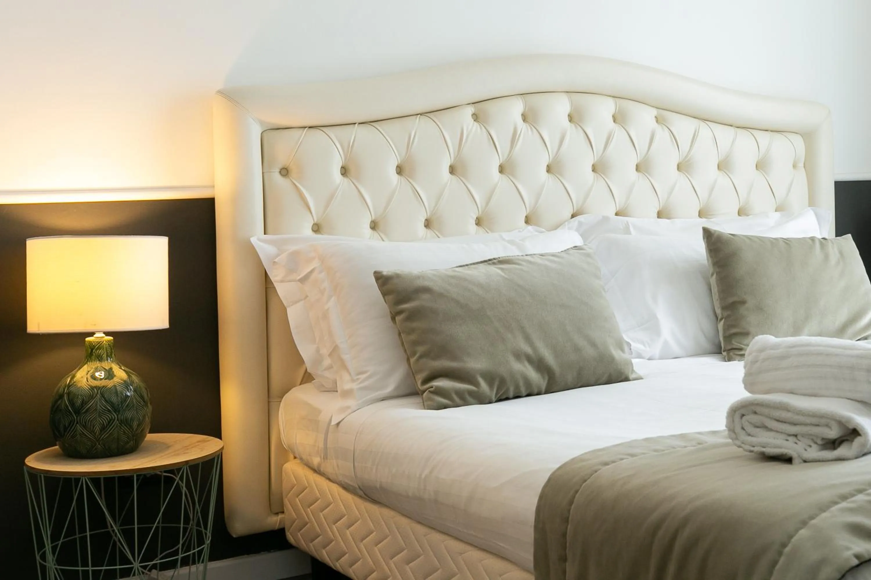 Bed in Capitolium Rooms