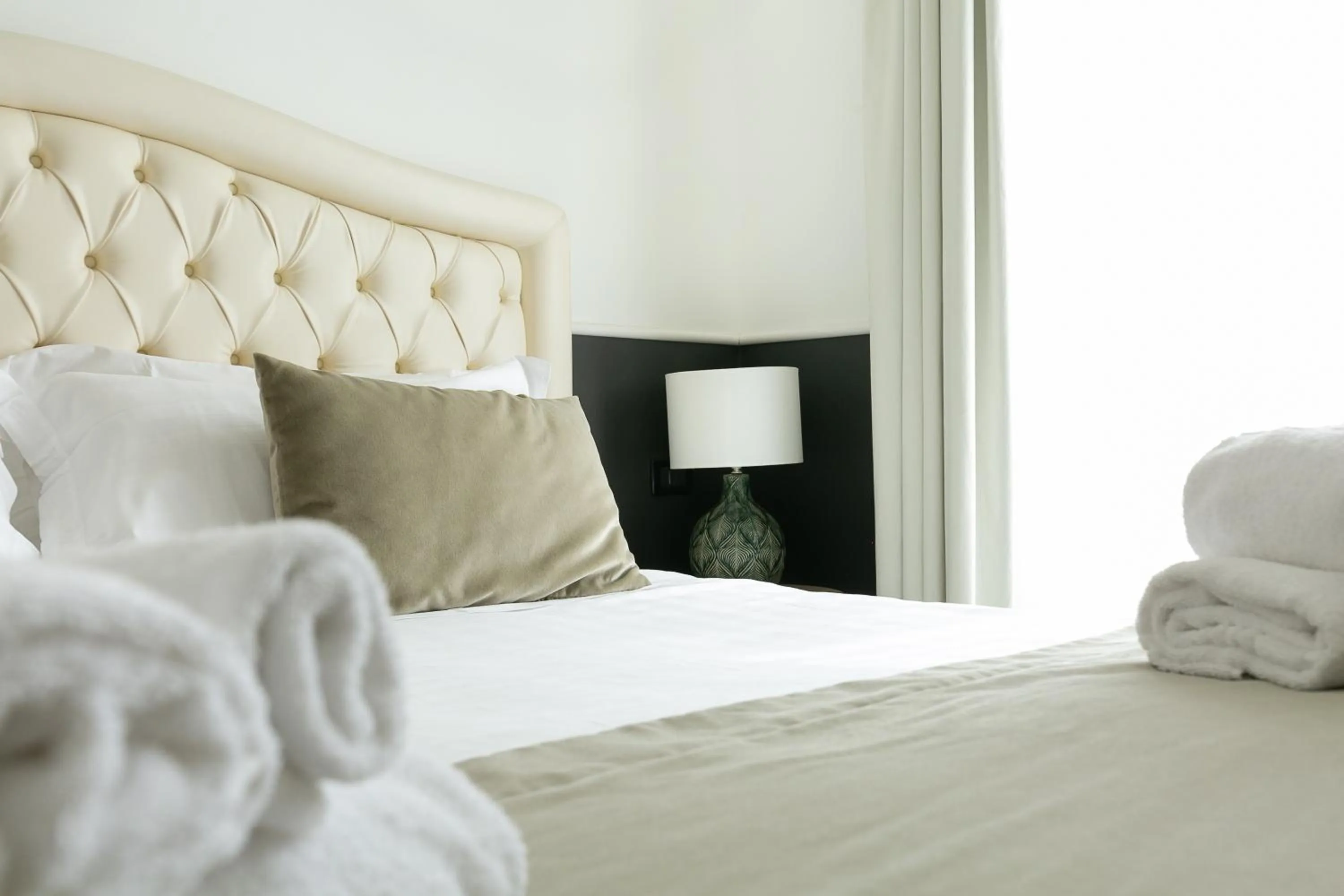 Bed in Capitolium Rooms