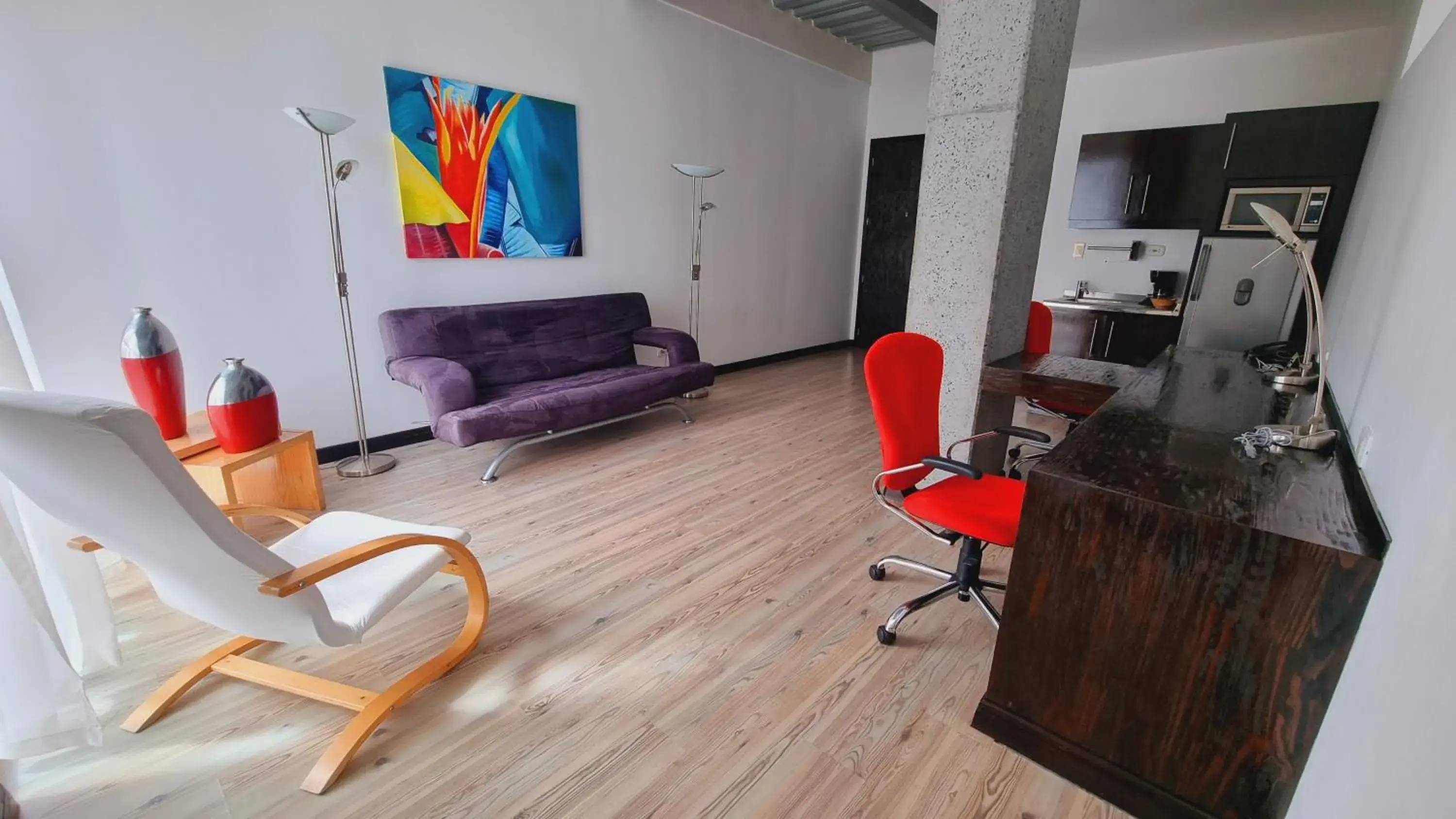 Living room in Habitat Suites Hotel By GHO Hoteles Living room in Habitat Suites Hotel By GHO Hoteles