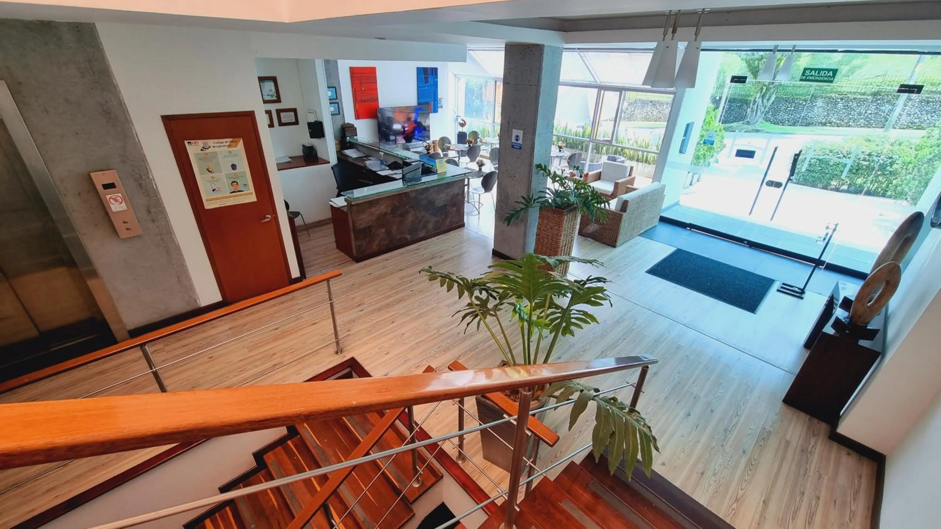 Lobby or reception in Habitat Suites Hotel By GHO Hoteles