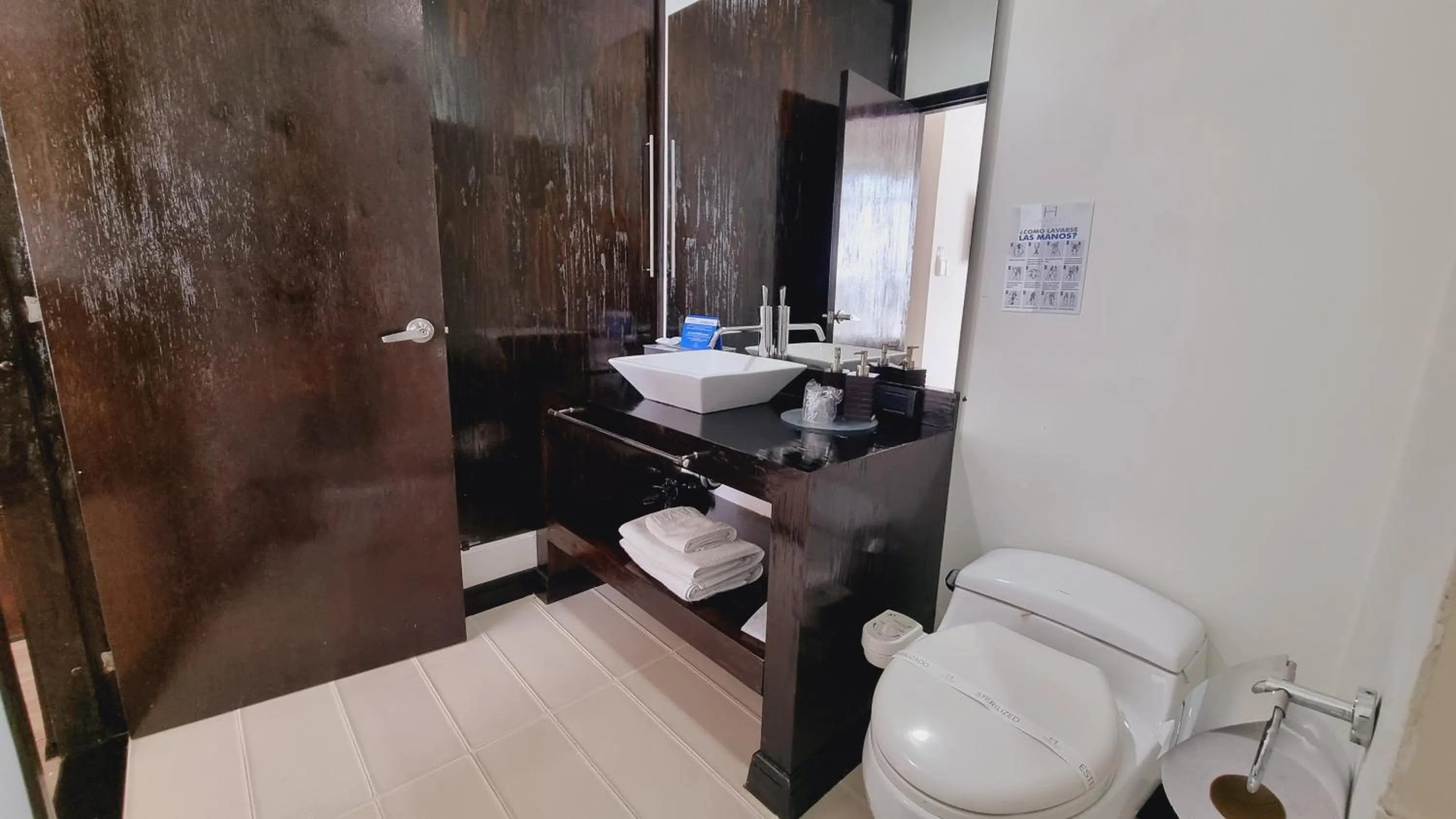 Bathroom in Habitat Suites Hotel By GHO Hoteles