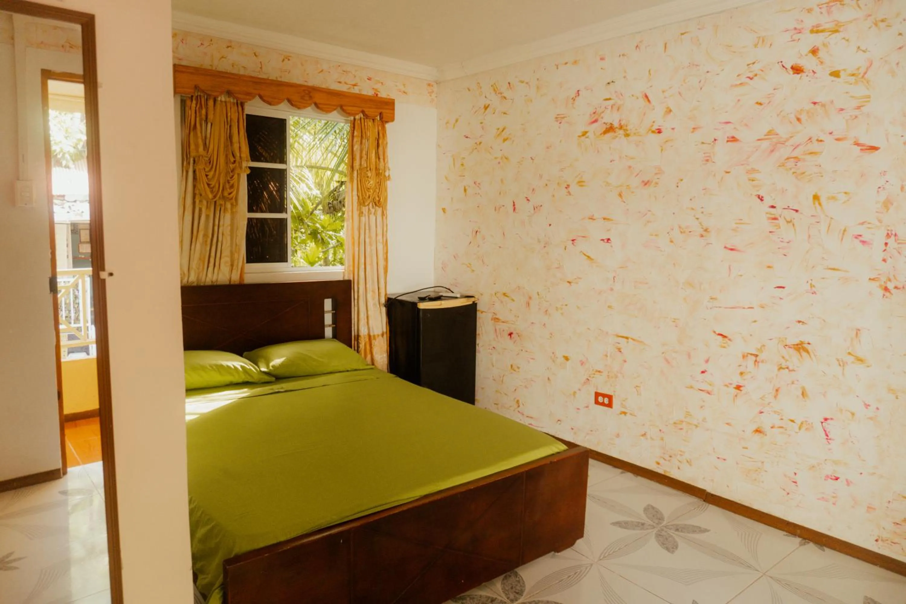 Bed in POSADA NATIVA DERMA´S INN