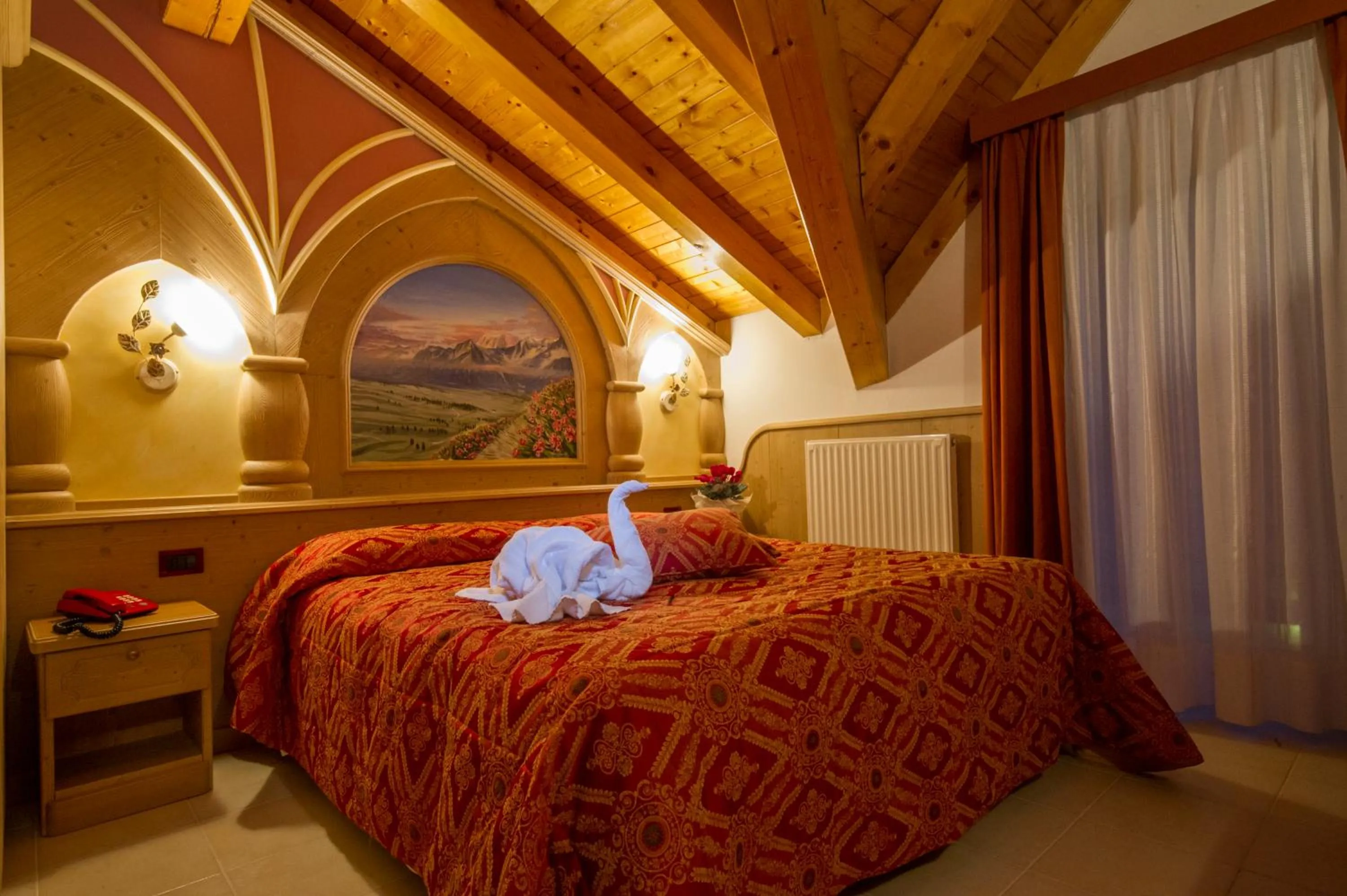 Bed in Hotel Orchidea