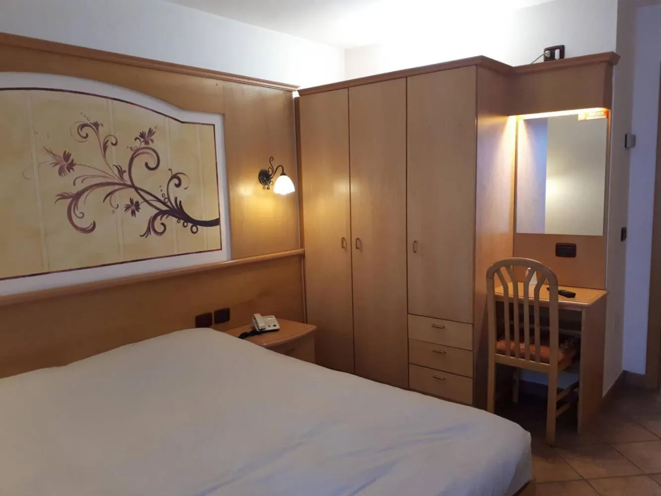 Bed in Hotel Orchidea