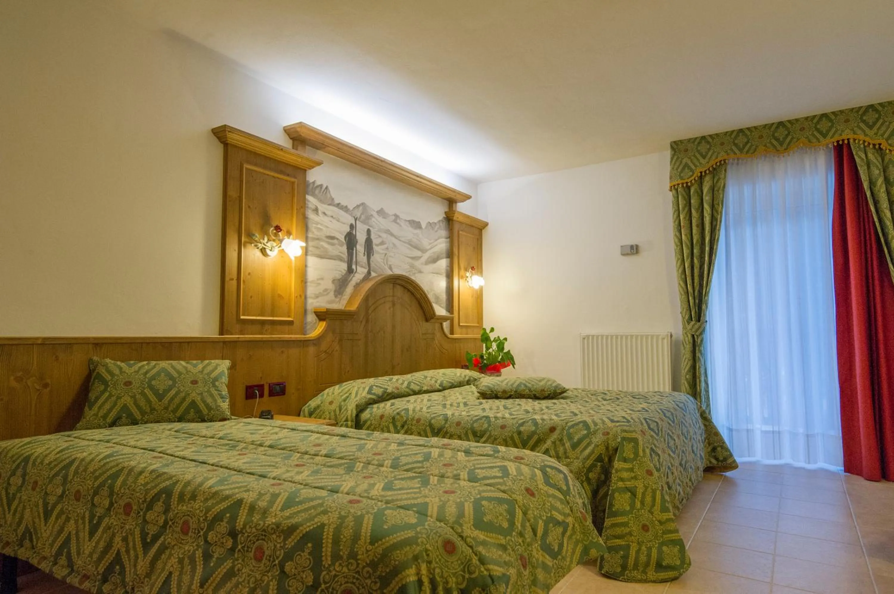 Bed in Hotel Orchidea