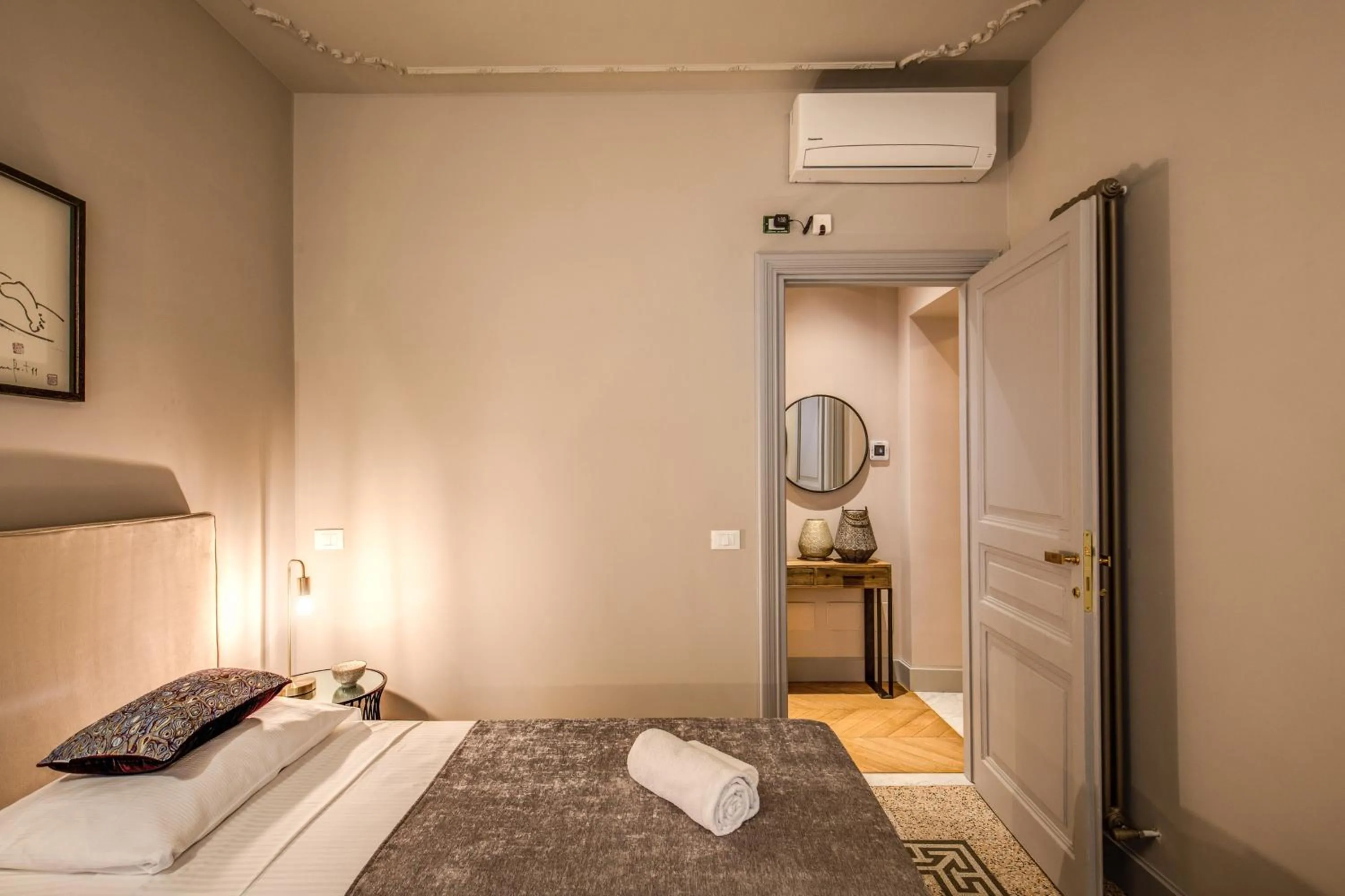 Bed in DeCharme apartment with terrace in Monti