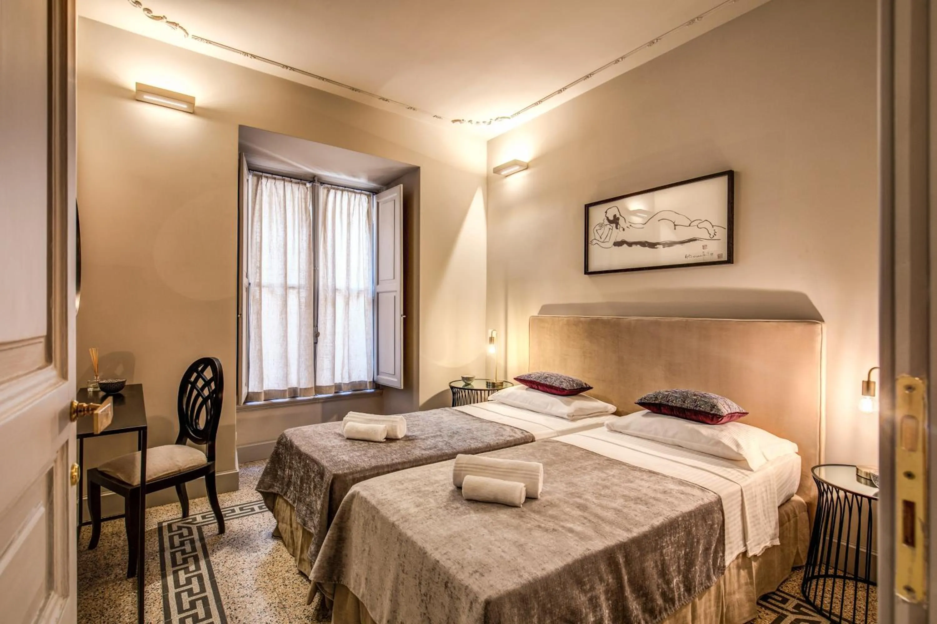 Bed in DeCharme apartment with terrace in Monti