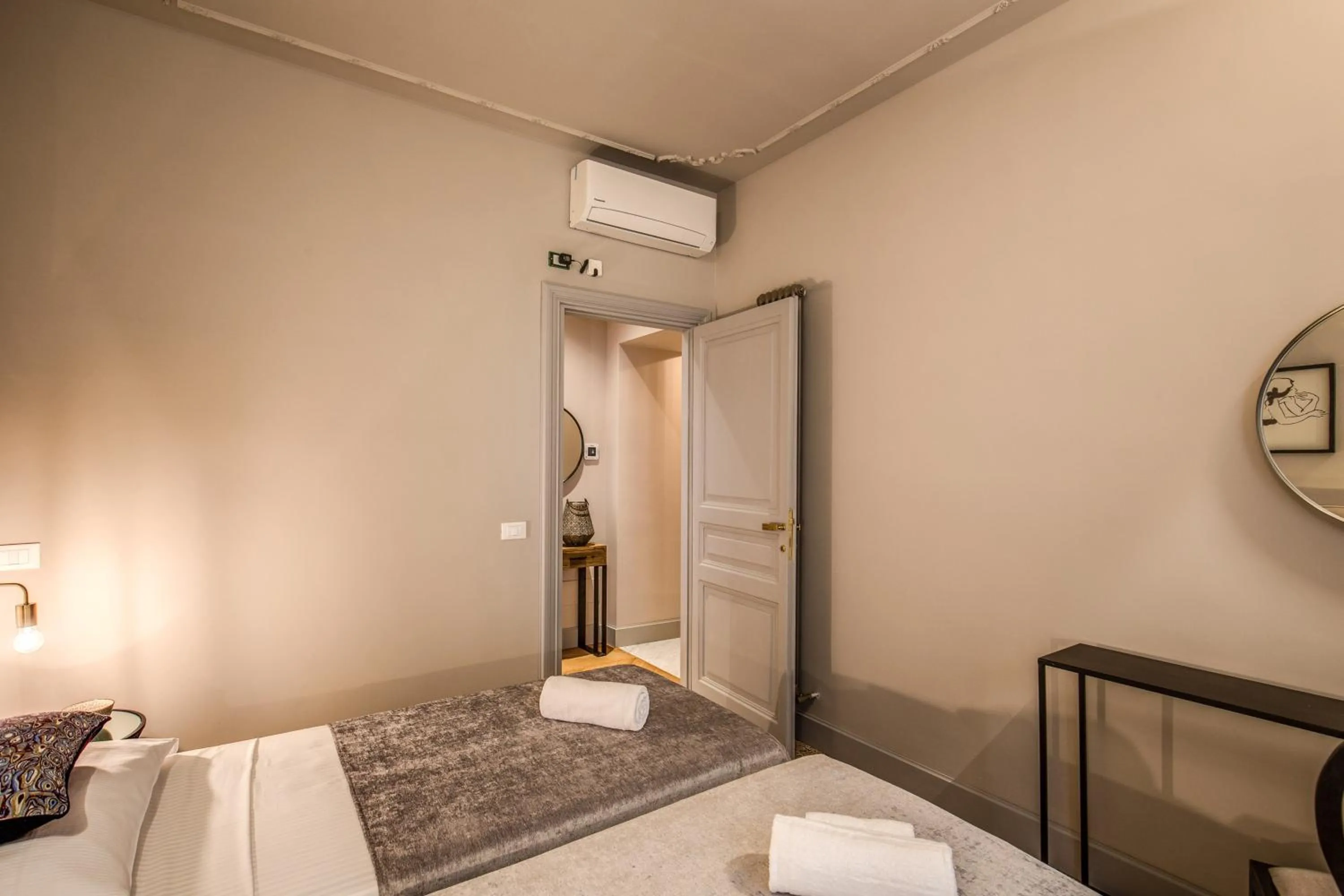 Bed in DeCharme apartment with terrace in Monti